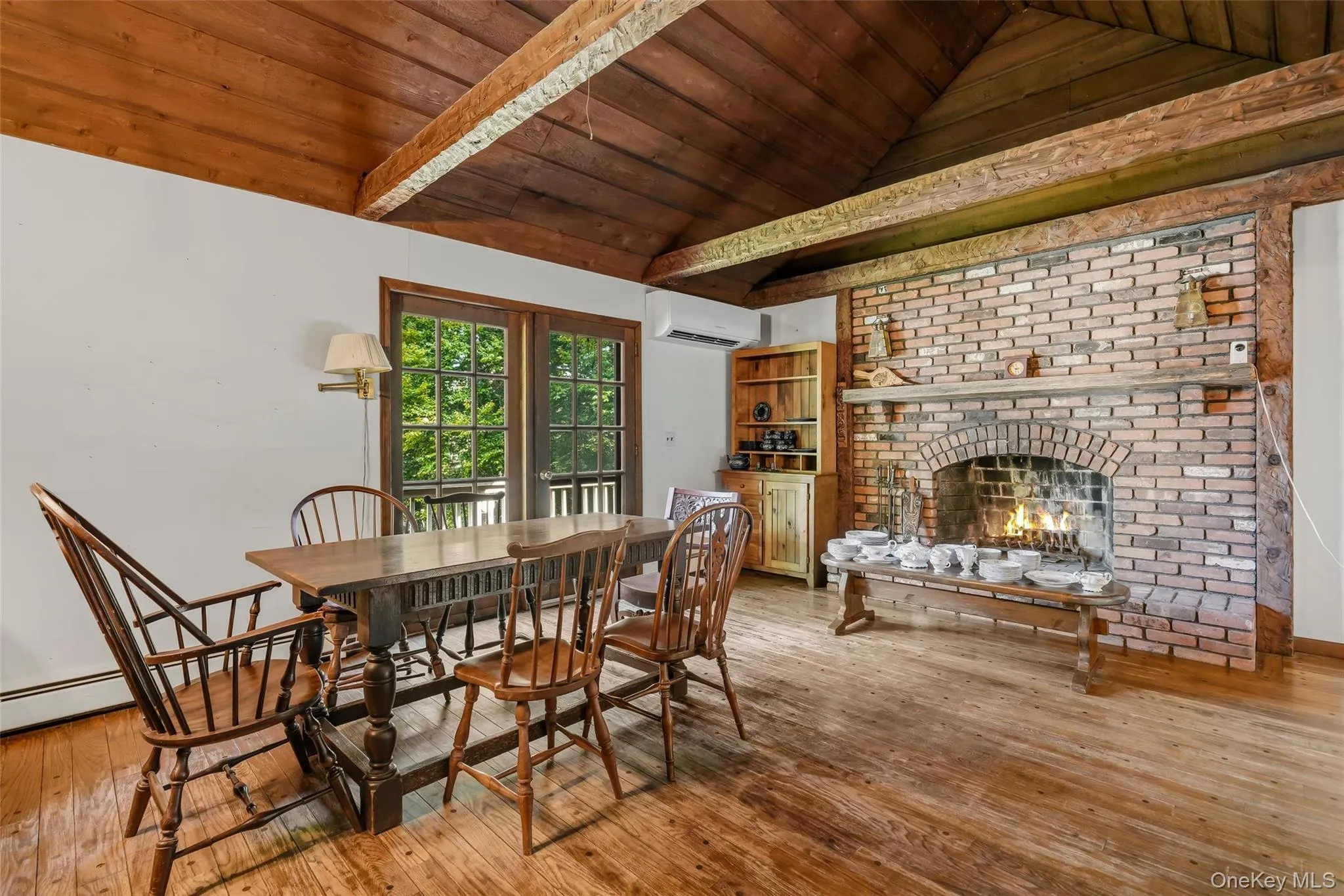 Notice the beautiful masonry fireplace surrounded by the brick mantle. Notice the beautiful masonry fireplace surrounded by the brick mantle.