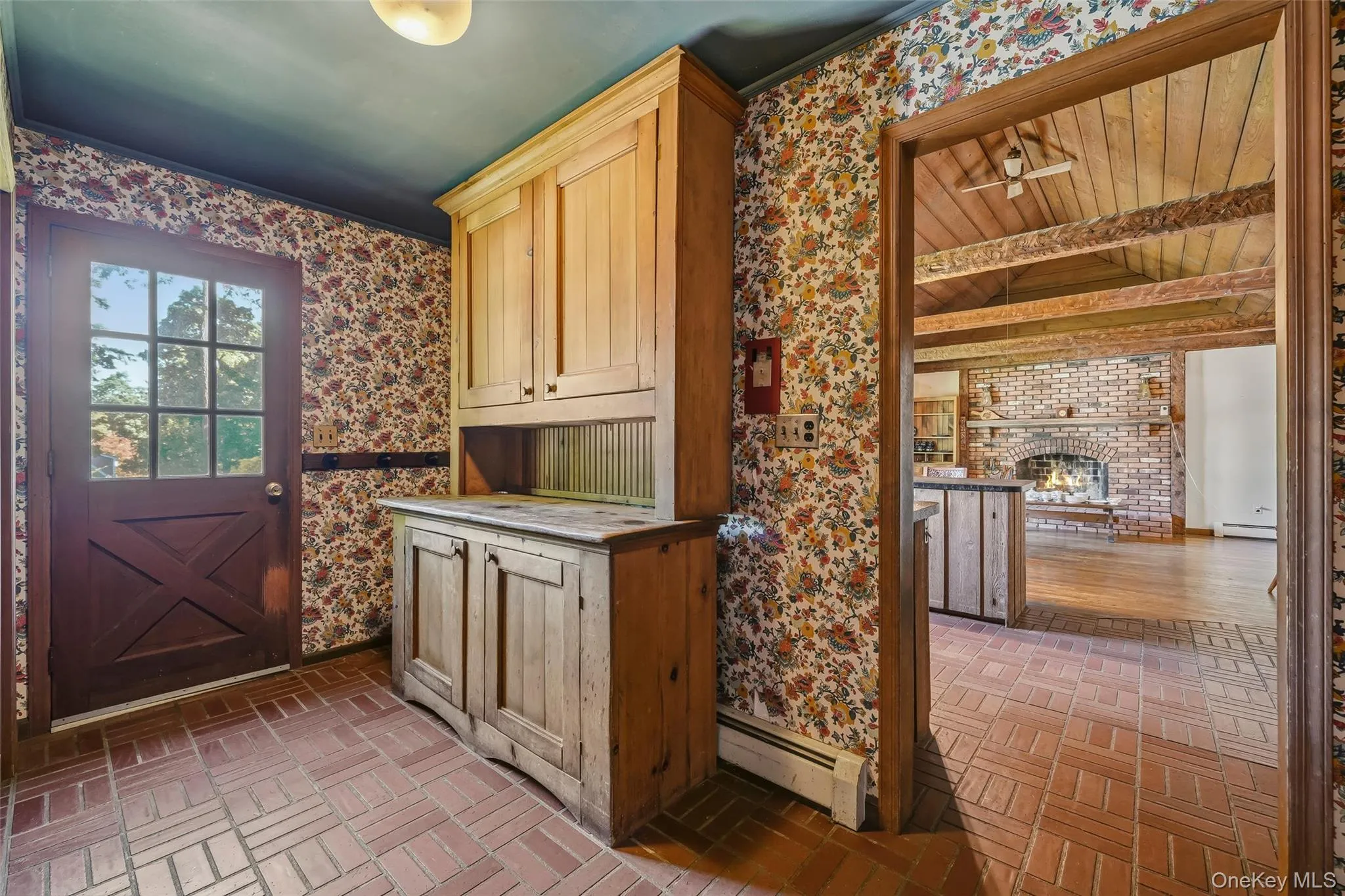 The mud room has a door to the rear deck. The mud room has a door to the rear deck.