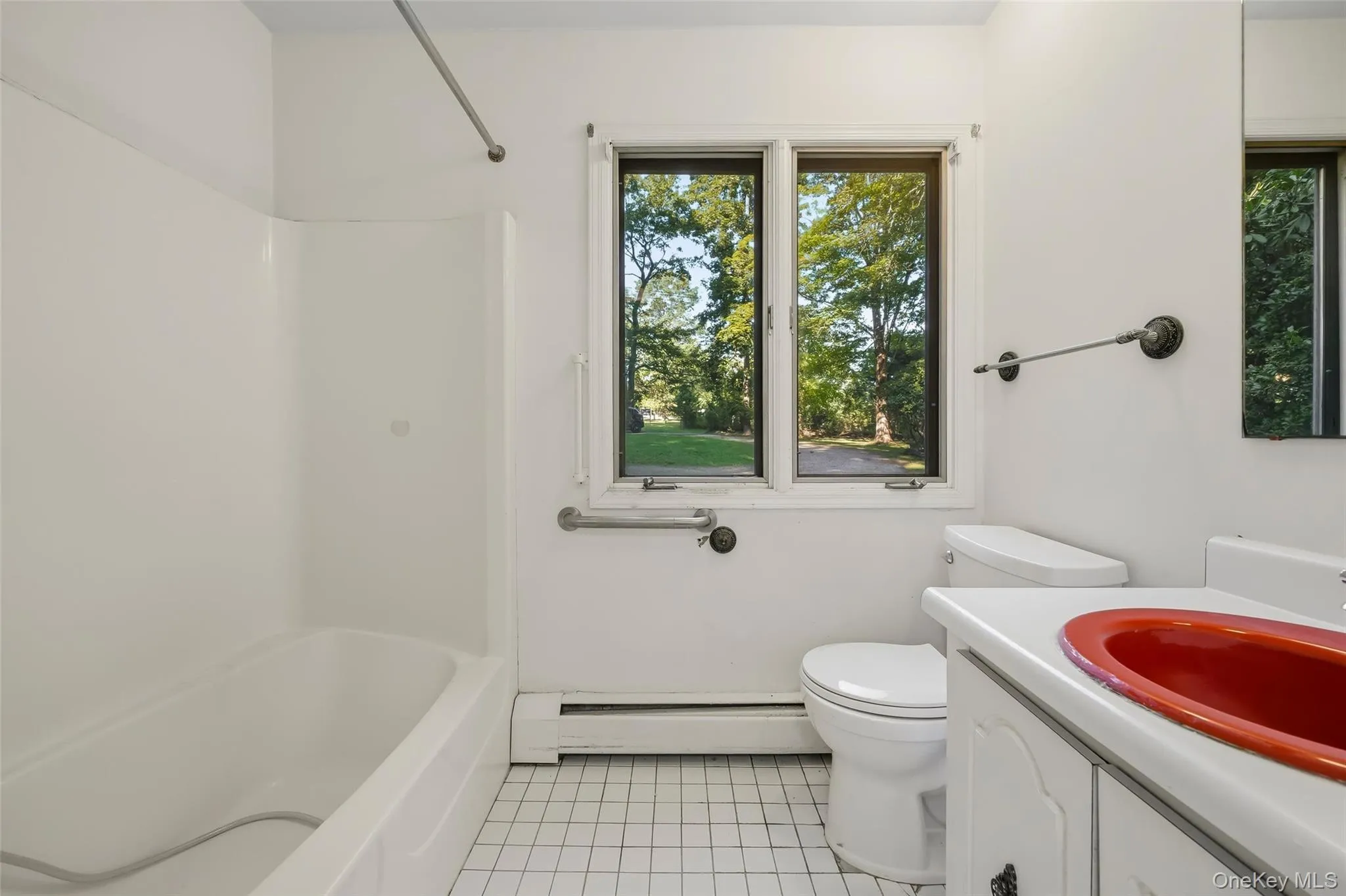 The primary bathroom has a tub, dressing area and makeup counter. The primary bathroom has a tub, dressing area and makeup counter.