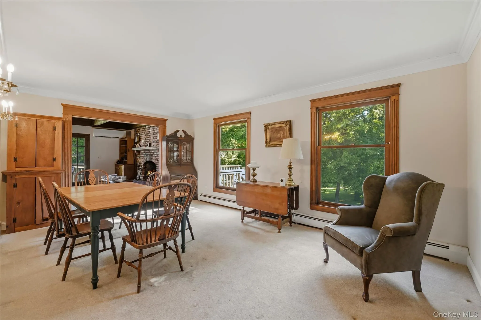 The dining room is open to the kitchen and living room. The dining room is open to the kitchen and living room.