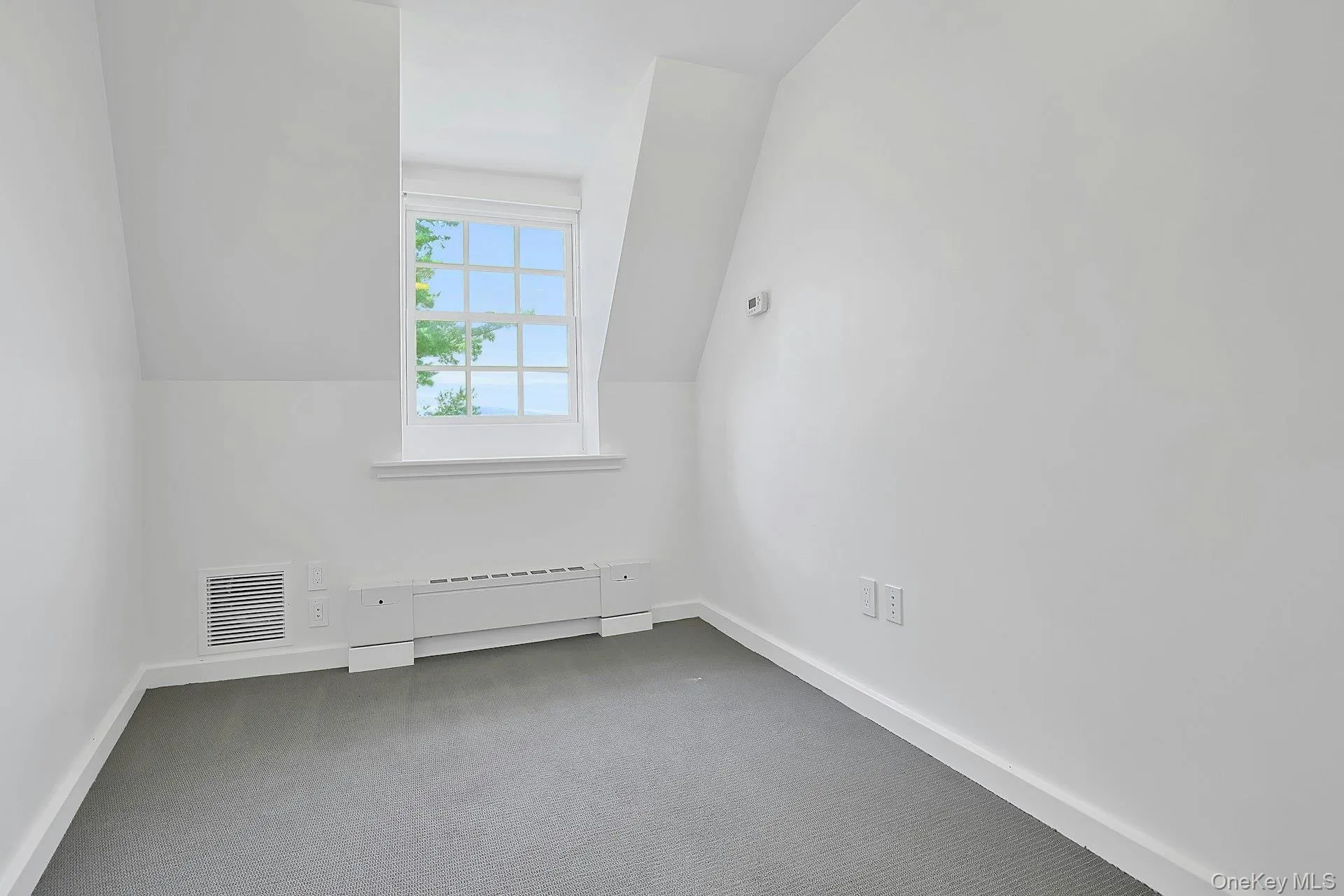 One of two bonus rooms on the upper level. How would you use this space? One of two bonus rooms on the upper level. How would you use this space?