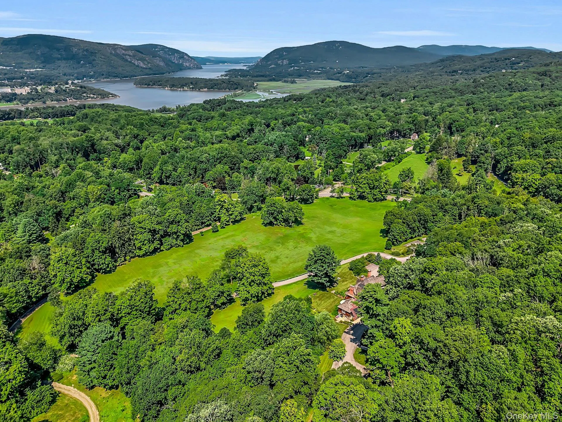 Perched in the verdant highlands along the Hudson River, the fields and rolling hills of this home are just minutes to the shore. Perched in the verdant highlands along the Hudson River, the fields and rolling hills of this home are just minutes to the shore.