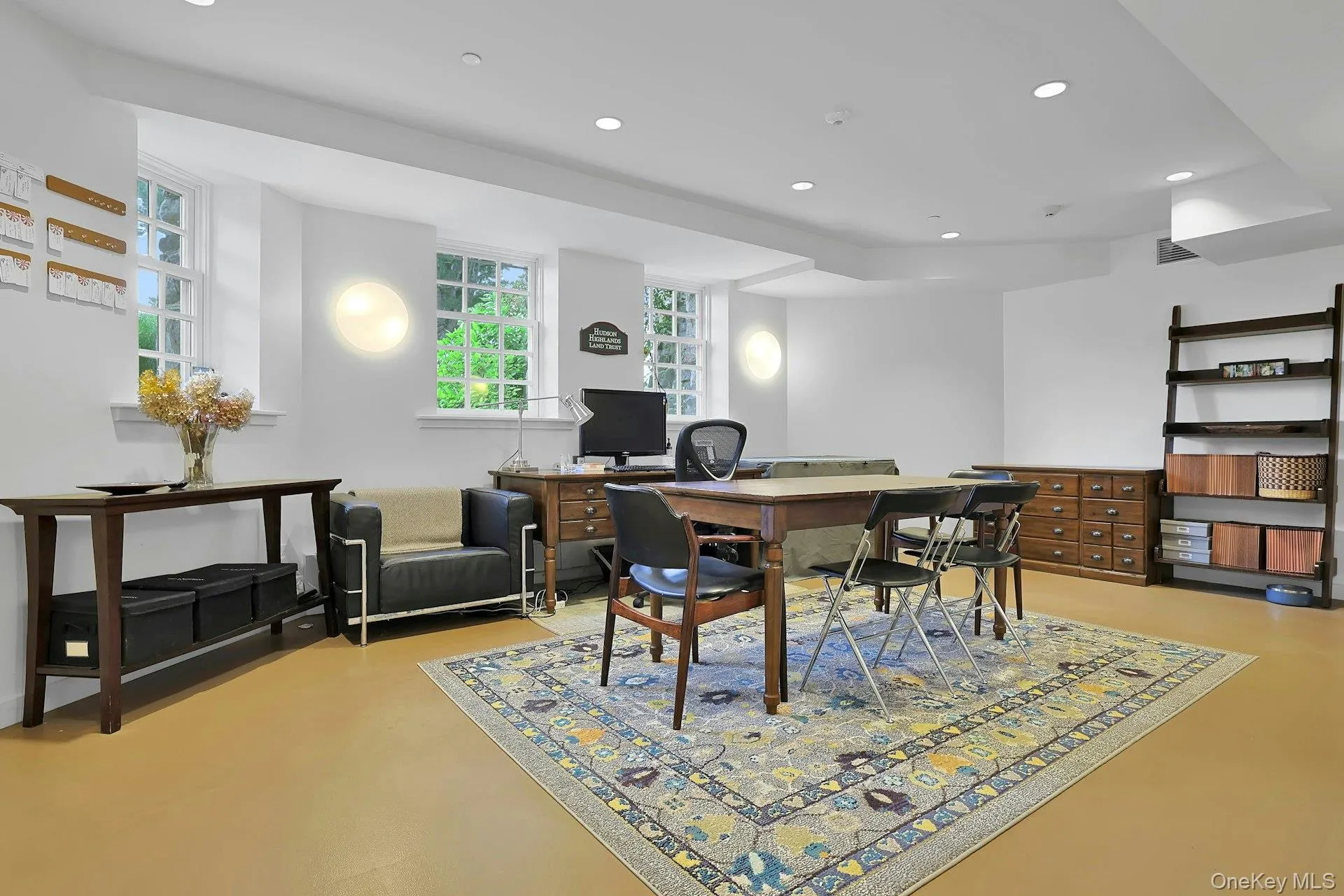 Also on the lower level, with large windows and an airy feeling, this would be a wonderful media room. Also on the lower level, with large windows and an airy feeling, this would be a wonderful media room.