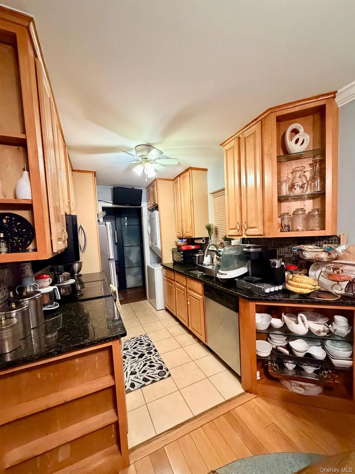 Chefs kitchen with plenty of cabinets for great storage and easy access. Granite counter compliments one of the most important rooms in your home. Stainless steel appliance give a polished look and built-ins offer another way to display your spices and kitchen essentials. Chefs kitchen with plenty of cabinets for great storage and easy access. Granite counter compliments one of the most important rooms in your home. Stainless steel appliance give a polished look and built-ins offer another way to display your spices and kitchen essentials.