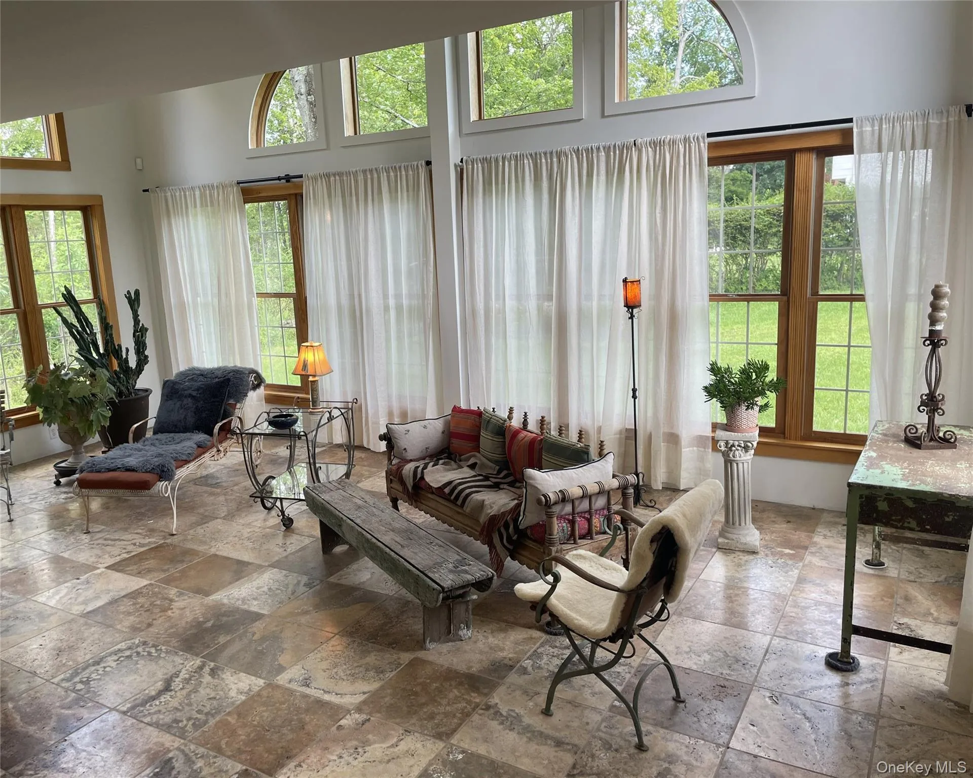 Elegant Great Room with floor to ceiling windows Elegant Great Room with floor to ceiling windows