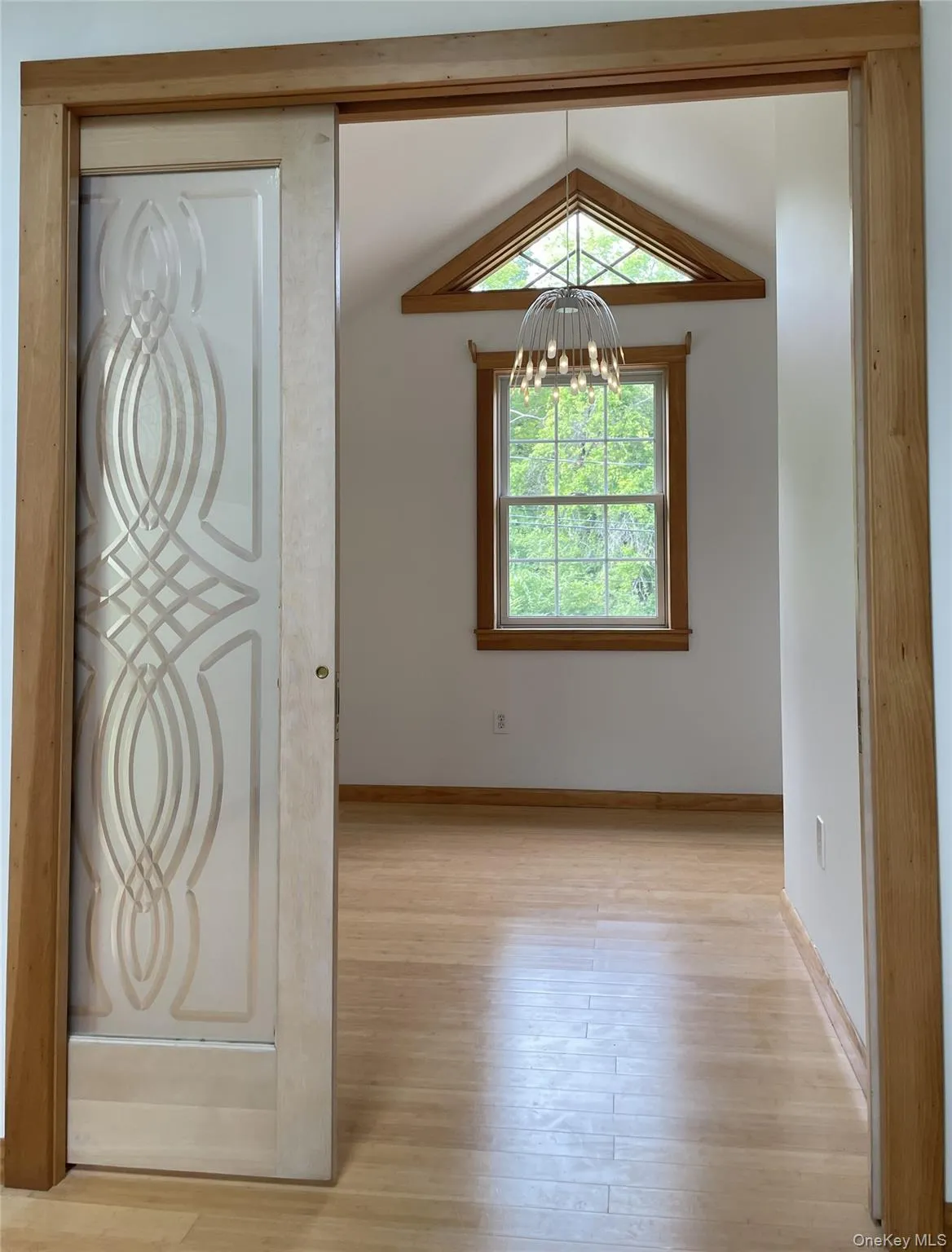 Etched glass door welcome you to the primary bedroom Etched glass door welcome you to the primary bedroom
