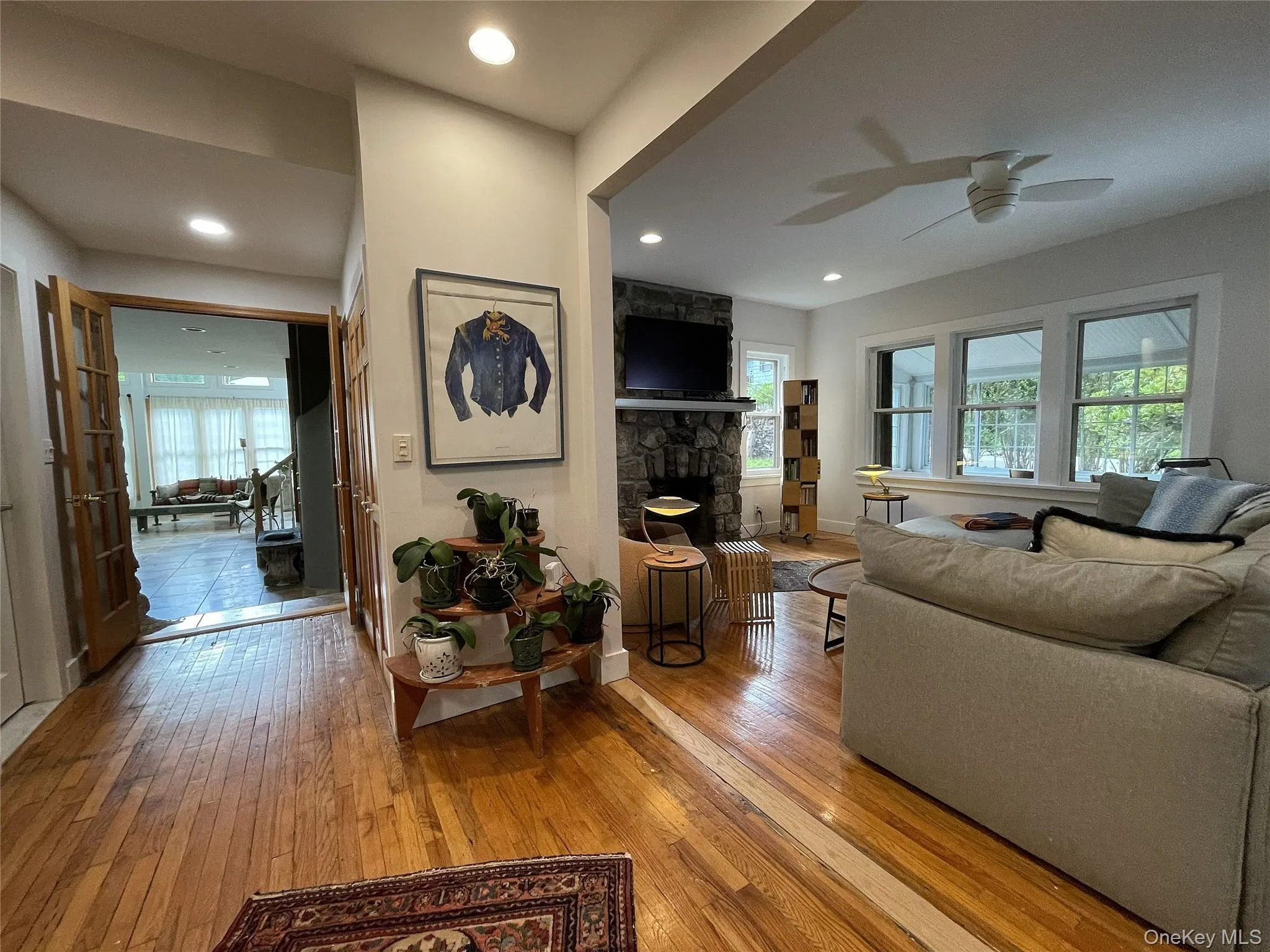Double doors lead to living areas w/gleaming hardwood floors Double doors lead to living areas w/gleaming hardwood floors
