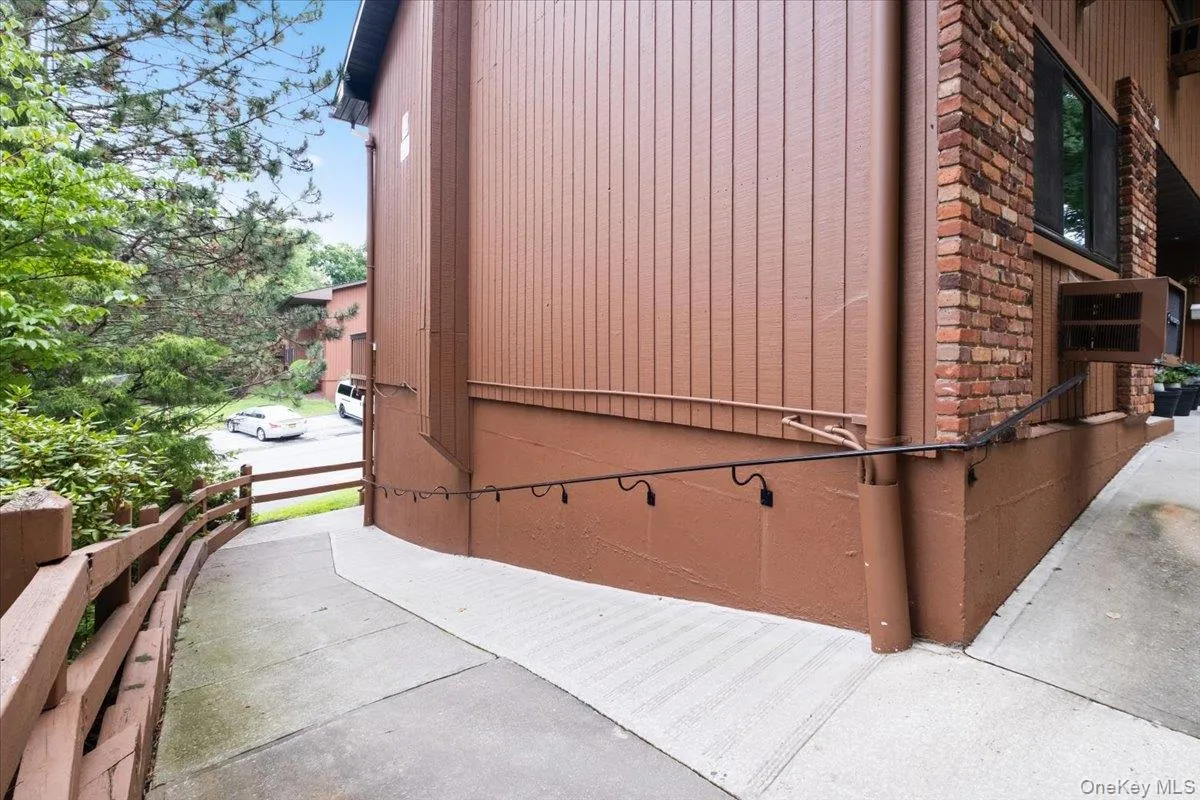 There's a convenient sidewalk to the parking area right outside your front door. Your locked basement storage is located just below the unit. There's a convenient sidewalk to the parking area right outside your front door. Your locked basement storage is located just below the unit.