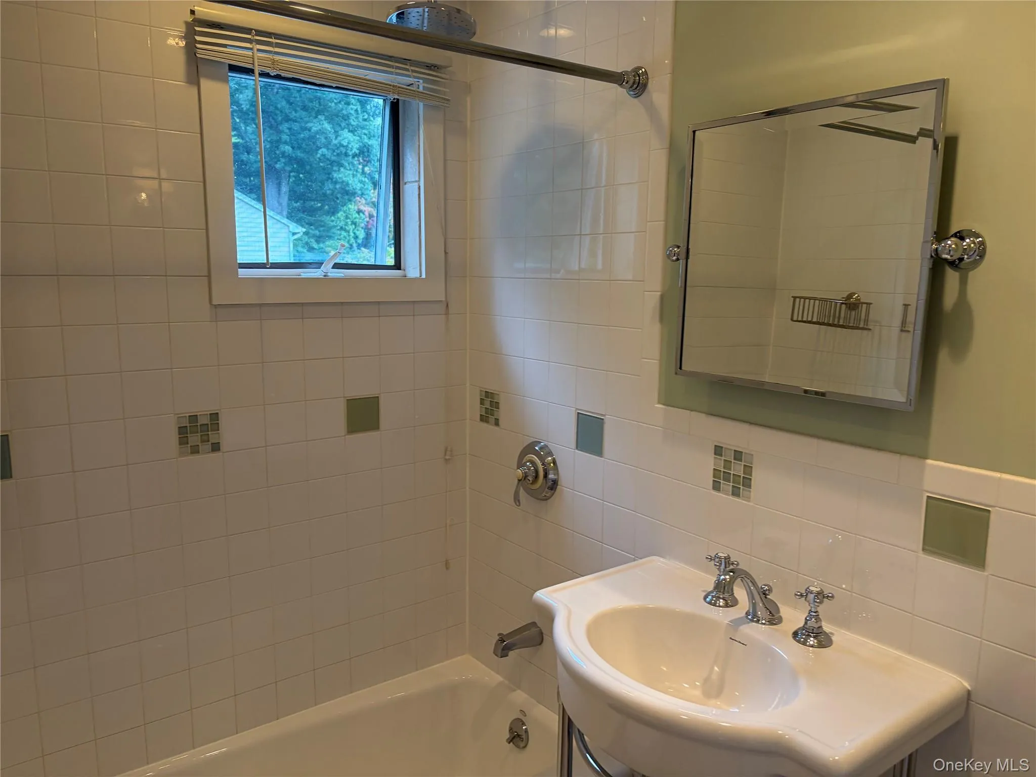 Updated bath with pedestal sink custom tile work Updated bath with pedestal sink custom tile work
