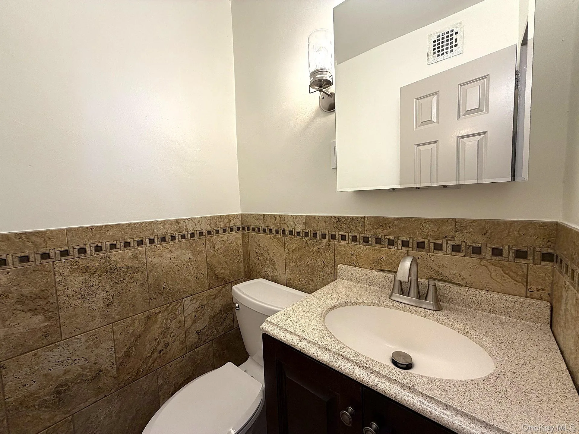 A convenient half bath in primary bedroom A convenient half bath in primary bedroom