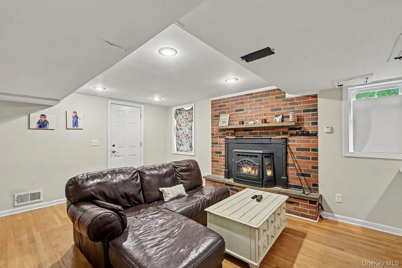 Lower level family features a fireplace. Lower level family features a fireplace.