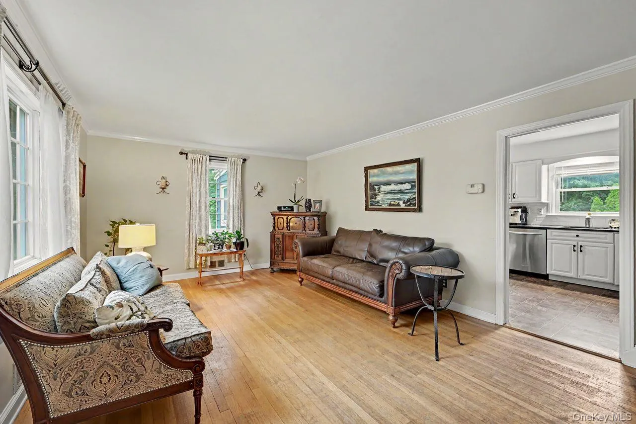 Living room has doorway to the kitchen. Living room has doorway to the kitchen.