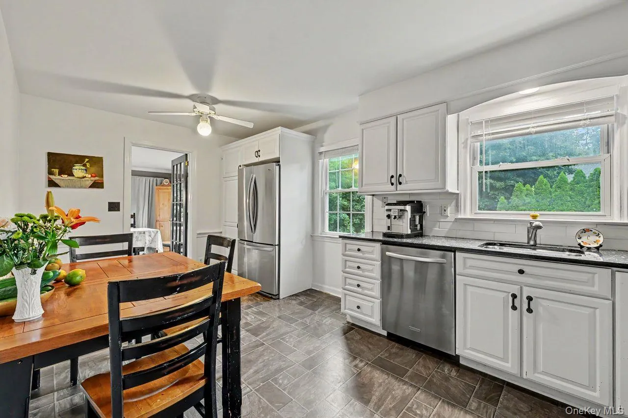 Kitchen has door to the dining room. Kitchen has door to the dining room.