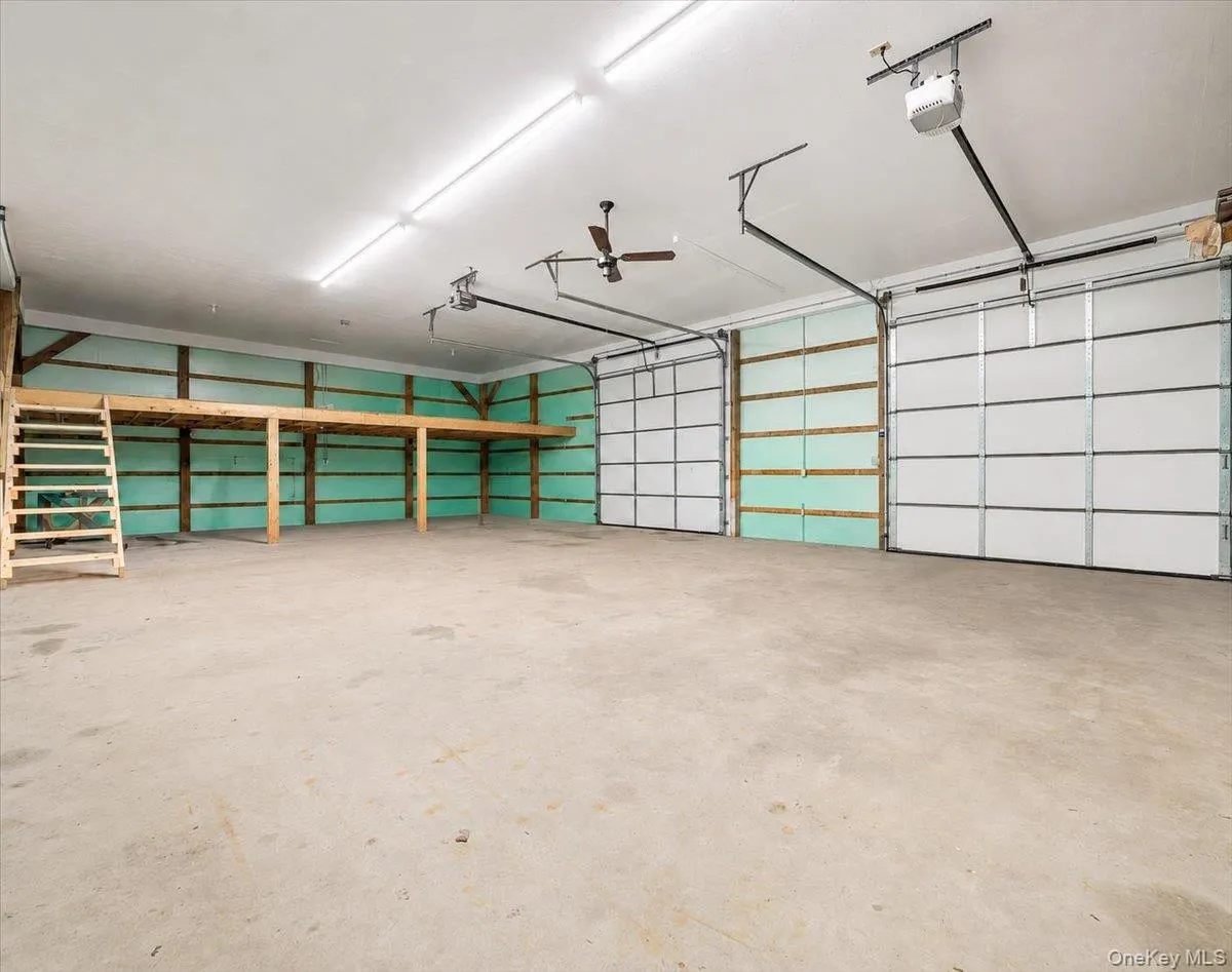 Inside heated Pole Barn -Garage area two 10' doors Inside heated Pole Barn -Garage area two 10' doors
