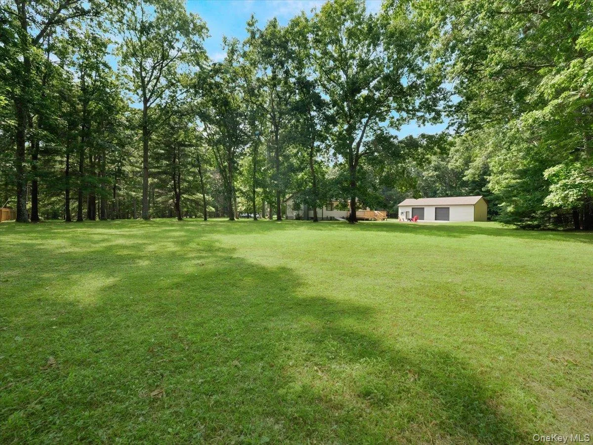 View of yard in back taken from a corner spot. View of yard in back taken from a corner spot.