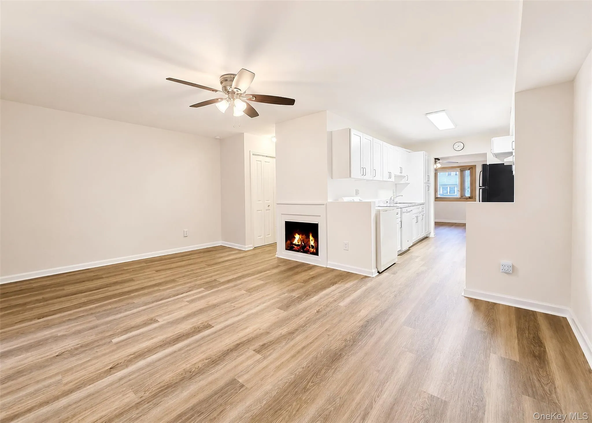 Living Room Also Has Wood Burning Fireplace & Ceiling Fan. Living Room Also Has Wood Burning Fireplace & Ceiling Fan.