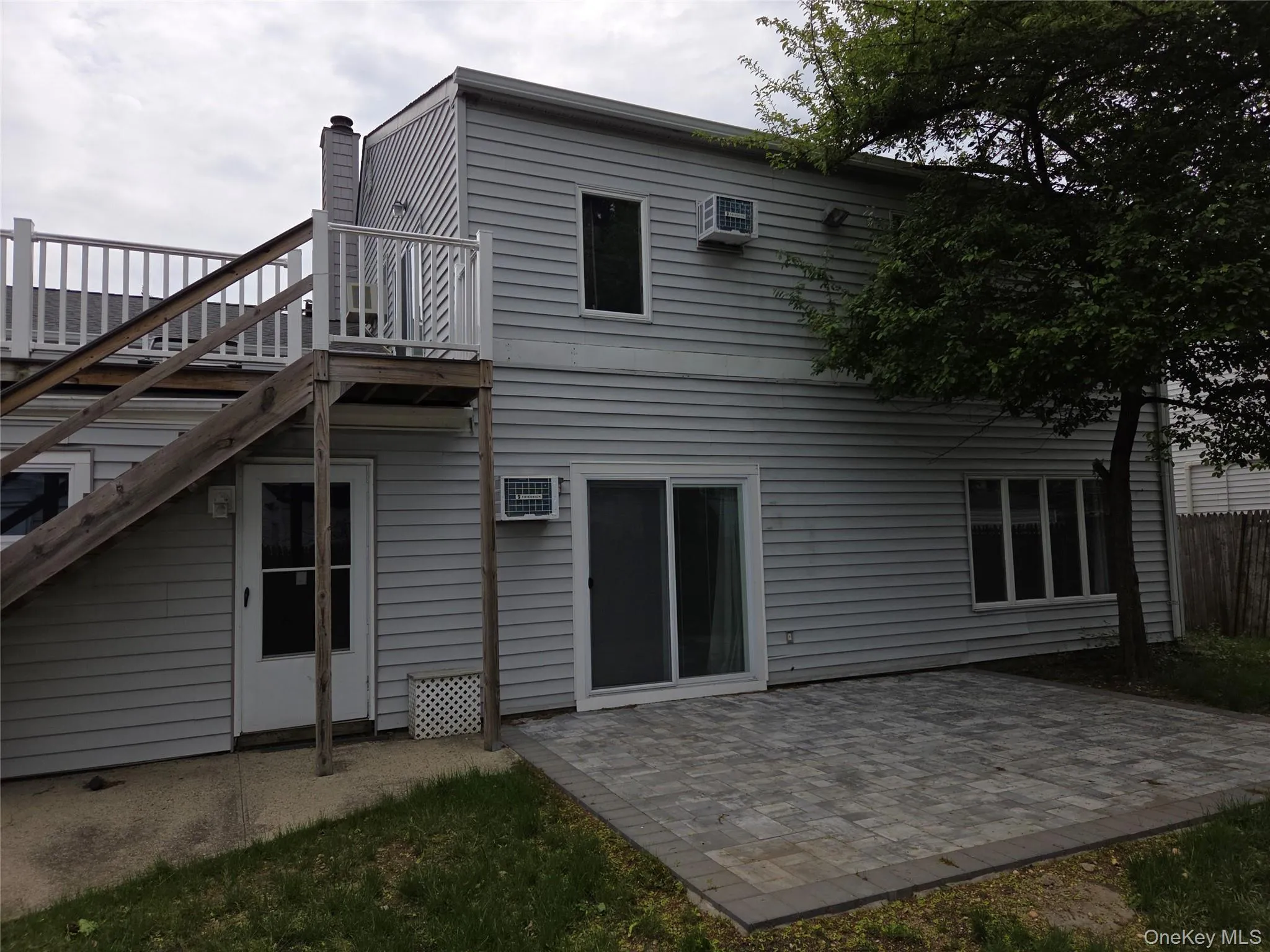 Patio and 2nd floor deck entrance Patio and 2nd floor deck entrance