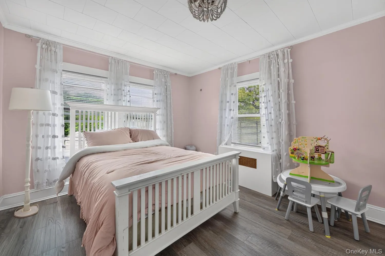 Light-filled second bedroom with a double closet Light-filled second bedroom with a double closet