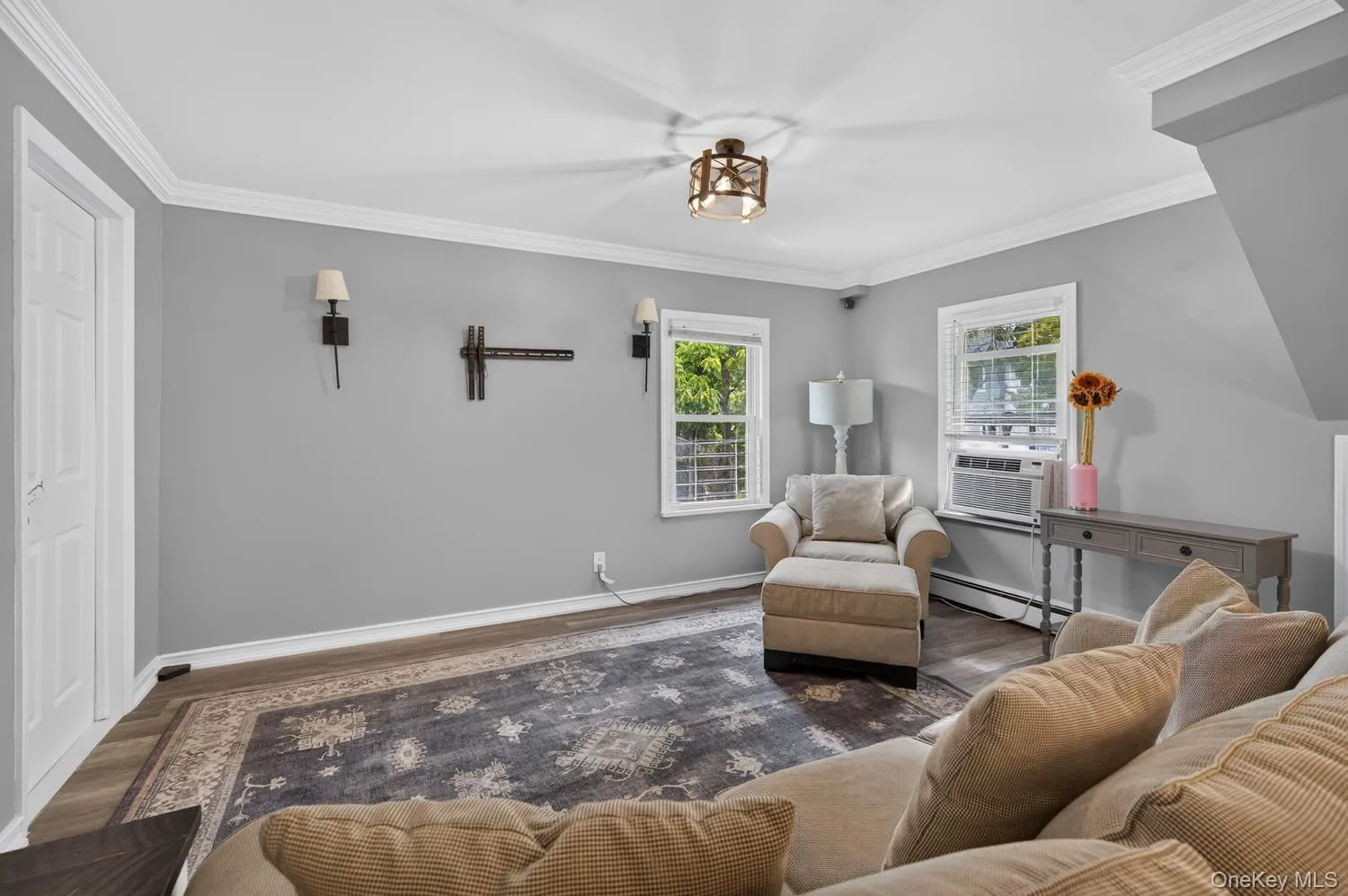 Comfortable living room with natural light and an easy, open feel Comfortable living room with natural light and an easy, open feel