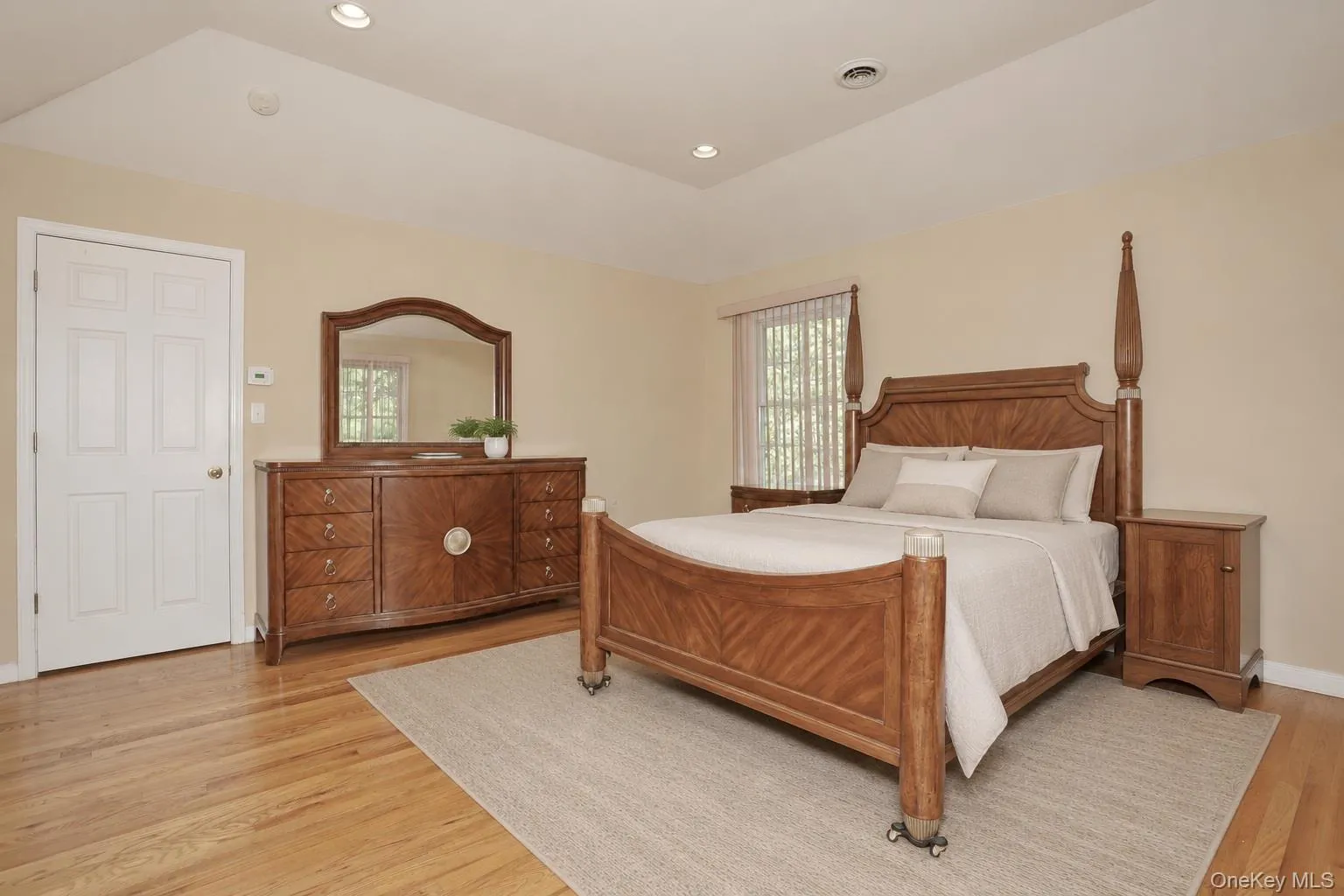 Primary Bedroom with vaulted ceiling Primary Bedroom with vaulted ceiling