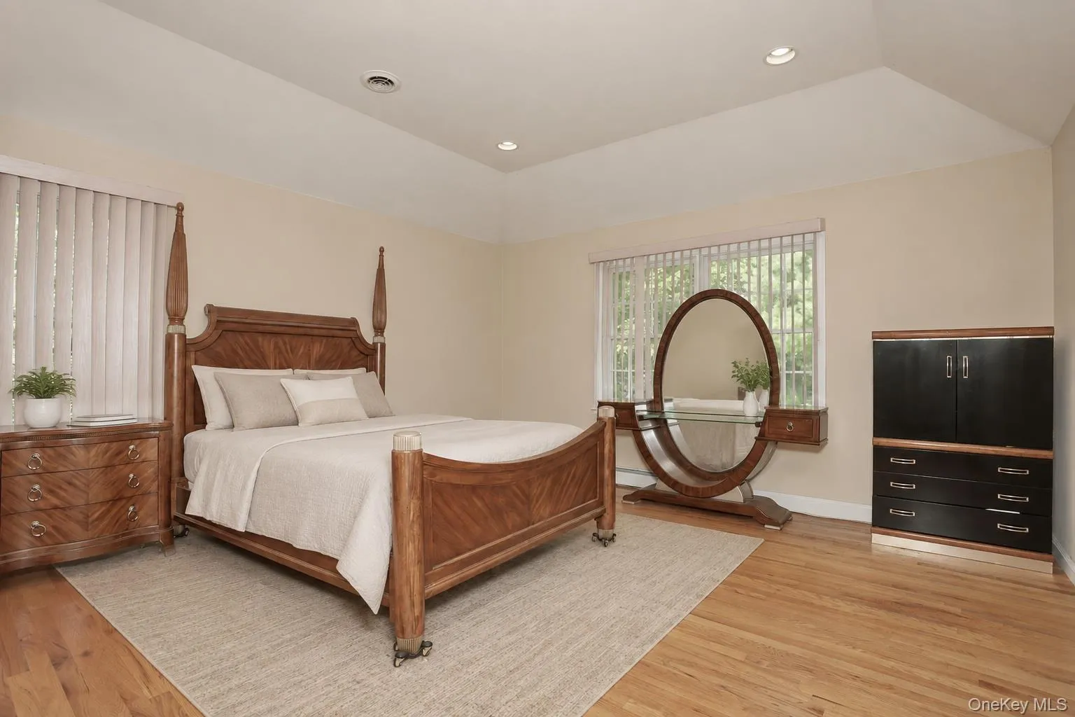 Primary Bedroom with vaulted ceiling Primary Bedroom with vaulted ceiling