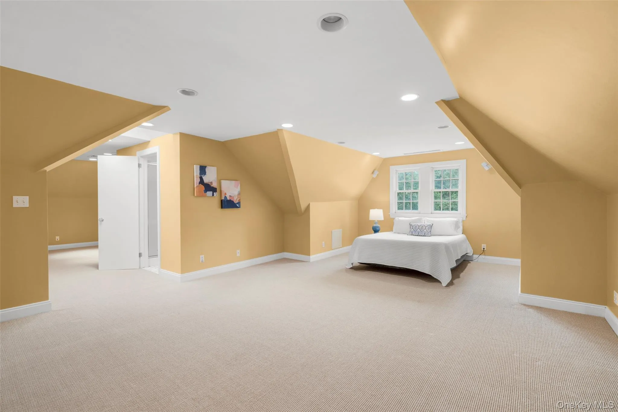 The third-level recreation room is currently being used as a bedroom. The third-level recreation room is currently being used as a bedroom.