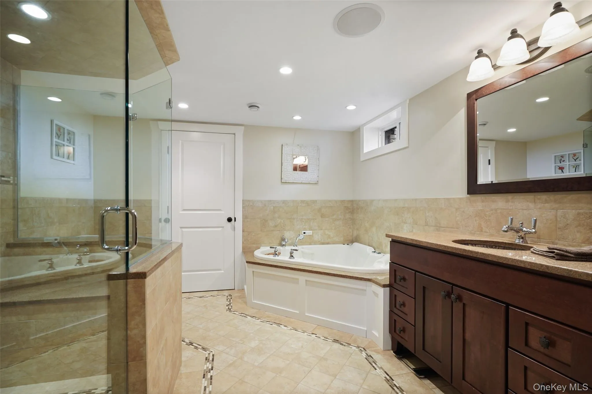 Lower level full bath with jet air tub and oversized shower Lower level full bath with jet air tub and oversized shower