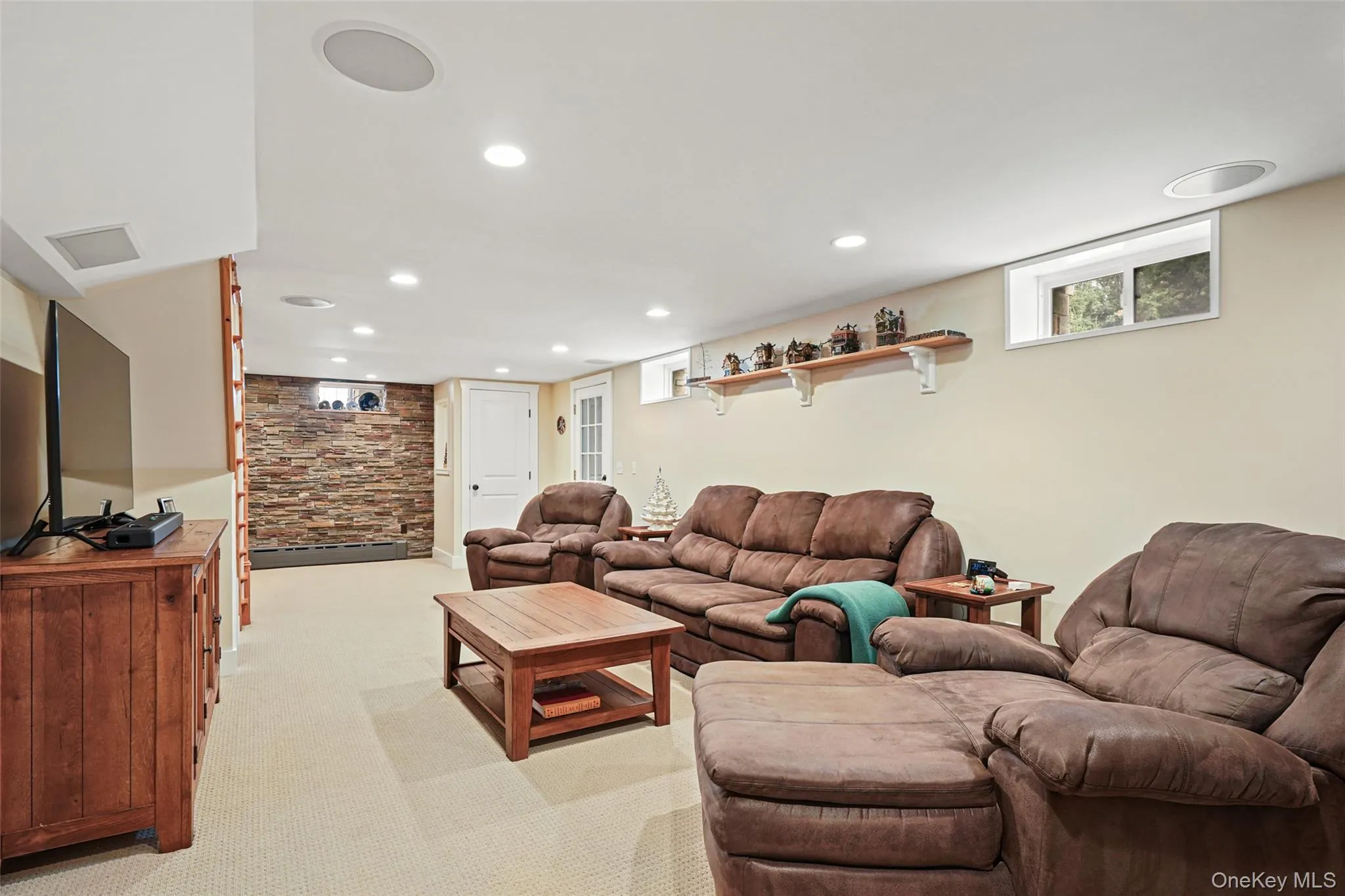 Alternate view of family room which has built in surround sound. Alternate view of family room which has built in surround sound.