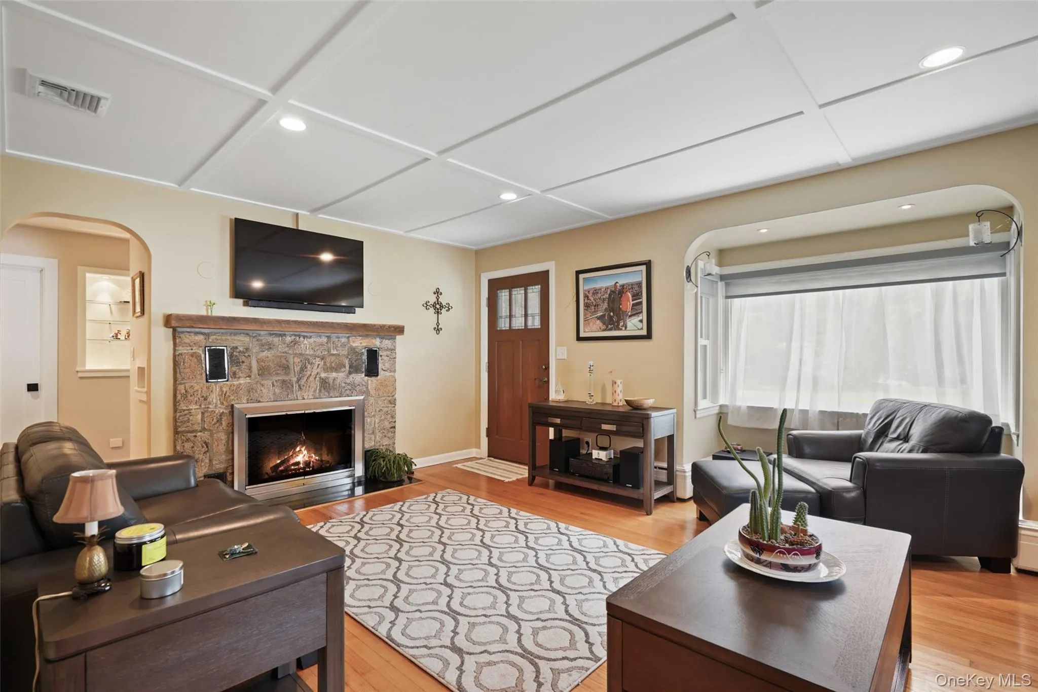 Light filled living room with fireplace Light filled living room with fireplace