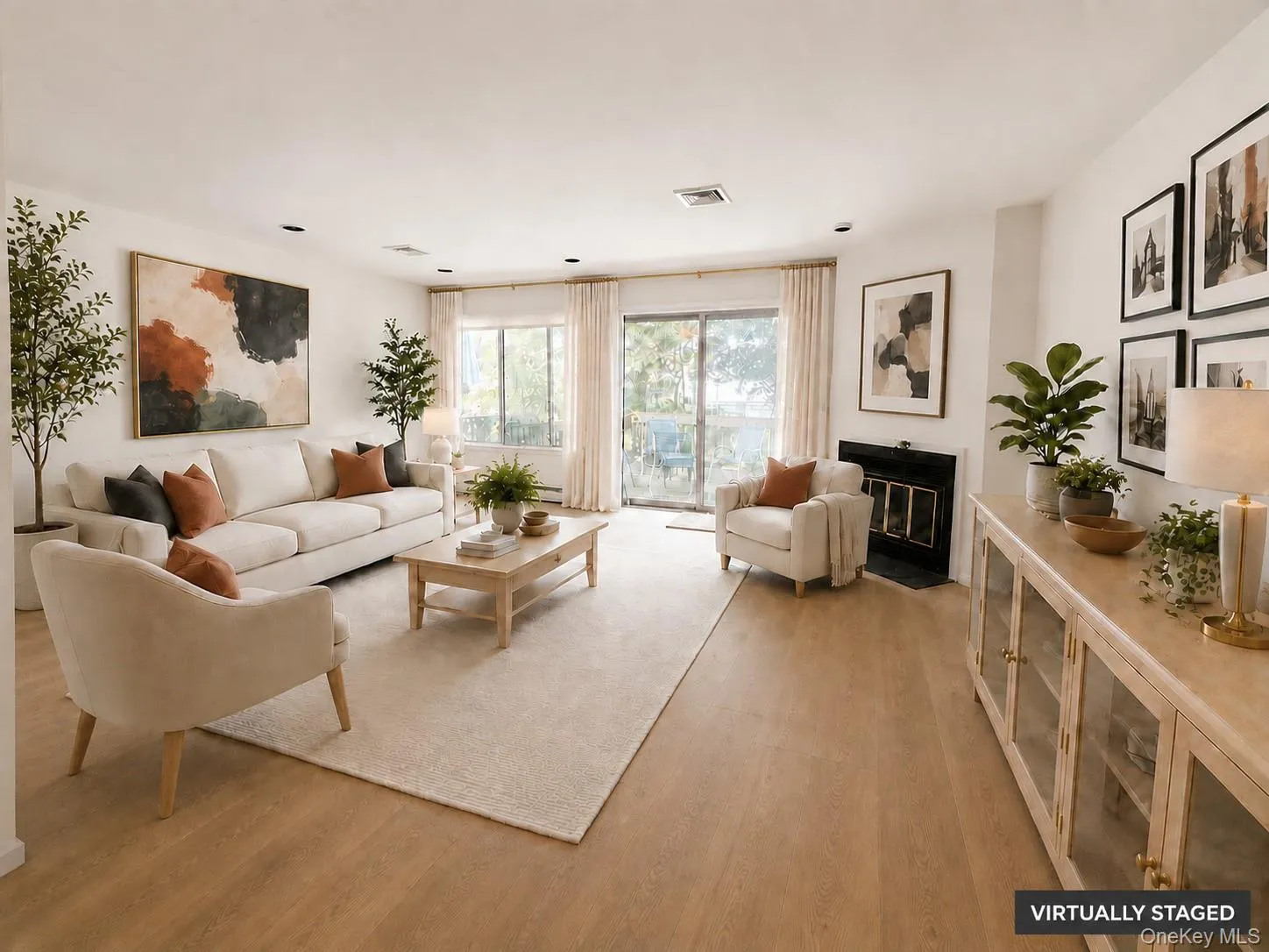 Virtually Staged -Wood-finish flooring, fireplace with black surround, recessed lighting, sliding glass door, built-in cabinetry with glass panels Virtually Staged -Wood-finish flooring, fireplace with black surround, recessed lighting, sliding glass door, built-in cabinetry with glass panels