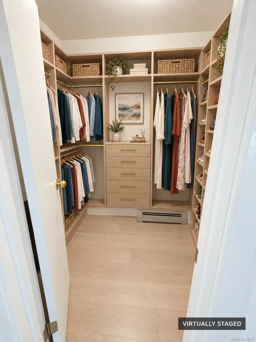 Walk-in closet in the Primary Bedroom Walk-in closet in the Primary Bedroom