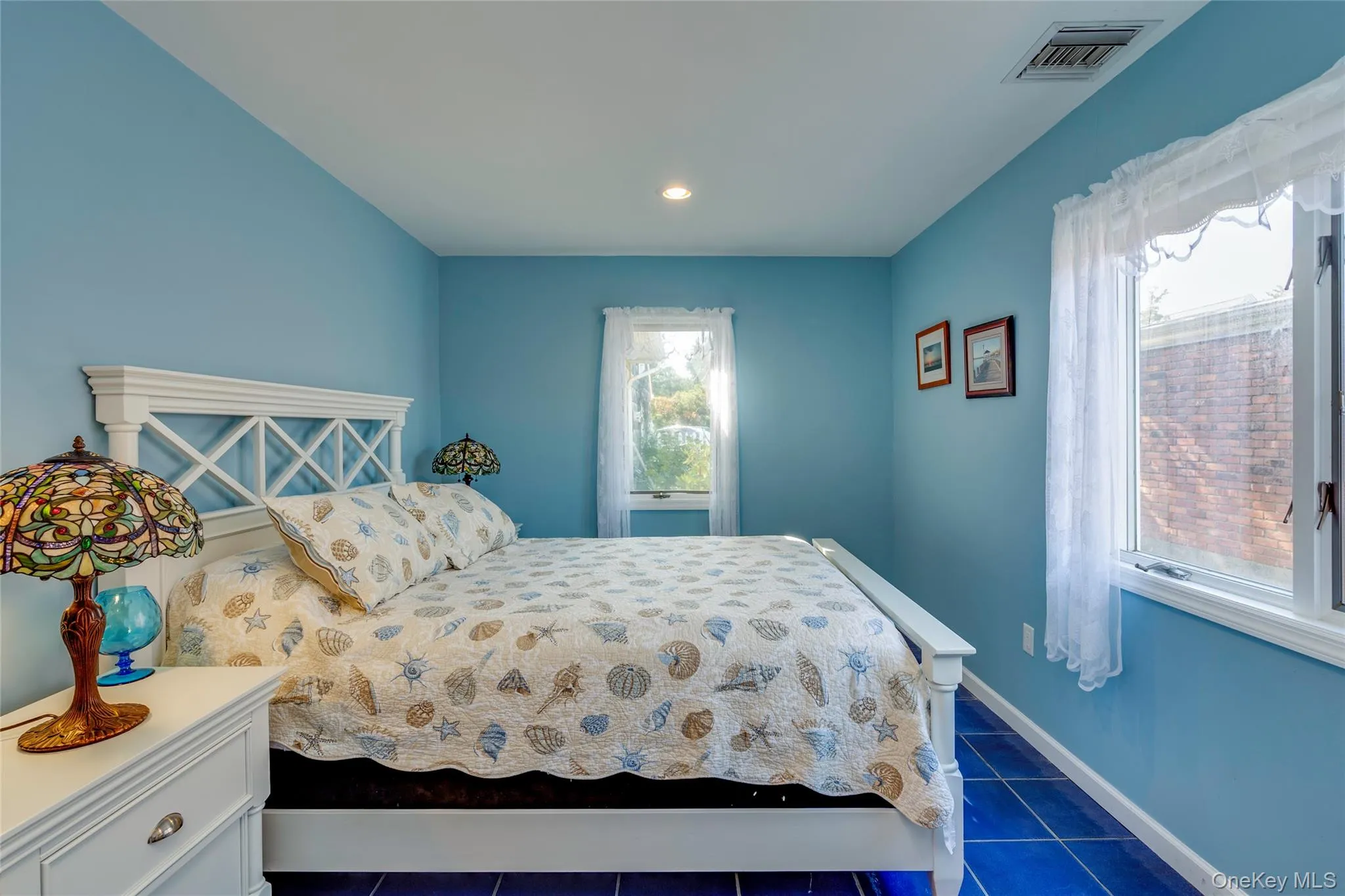 Largest bedroom with tile floors and double closet. Largest bedroom with tile floors and double closet.