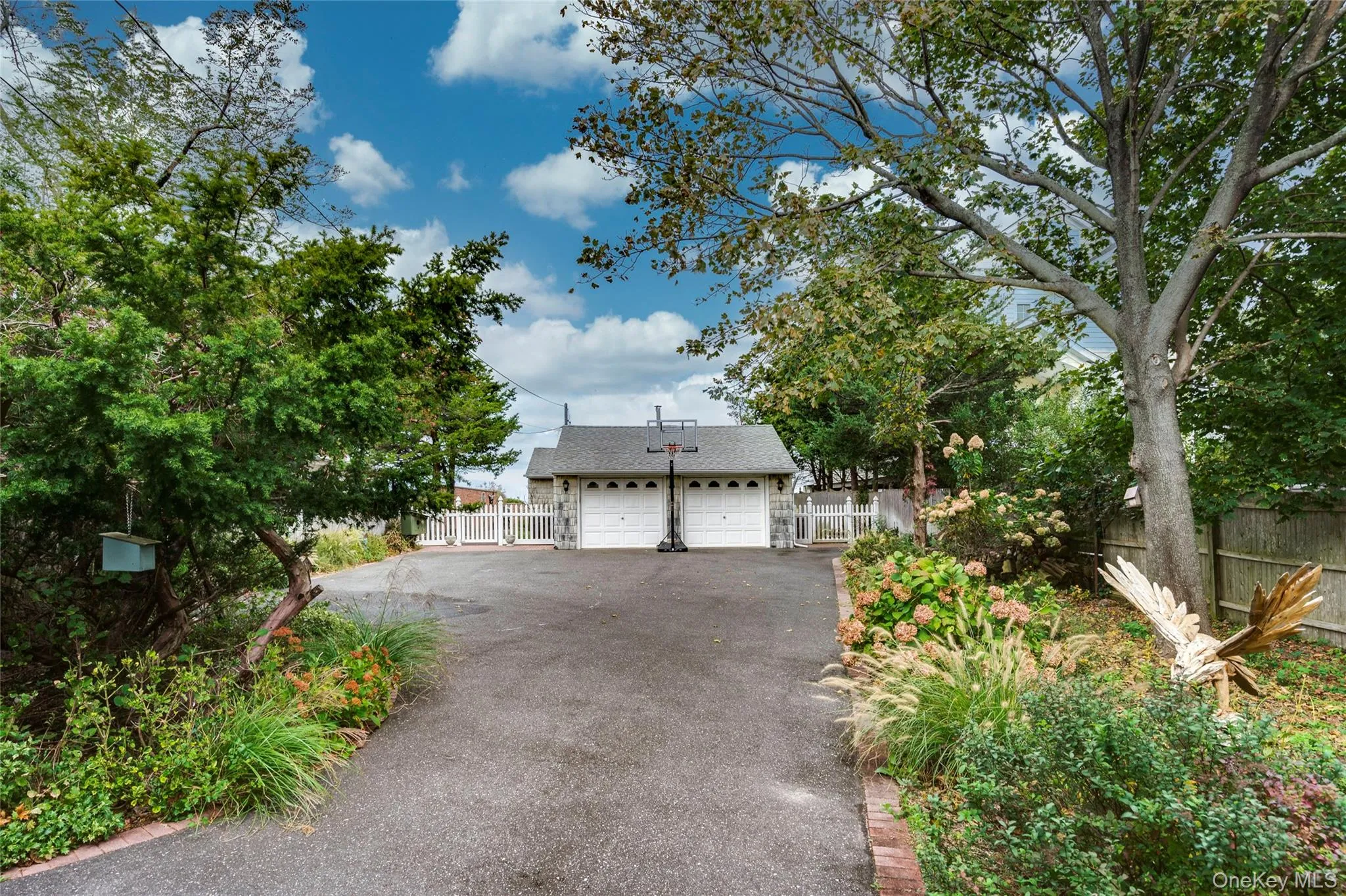 2-car garage with long driveway that can accommodate 6-cars. This can be yours for the off-season! 2-car garage with long driveway that can accommodate 6-cars. This can be yours for the off-season!