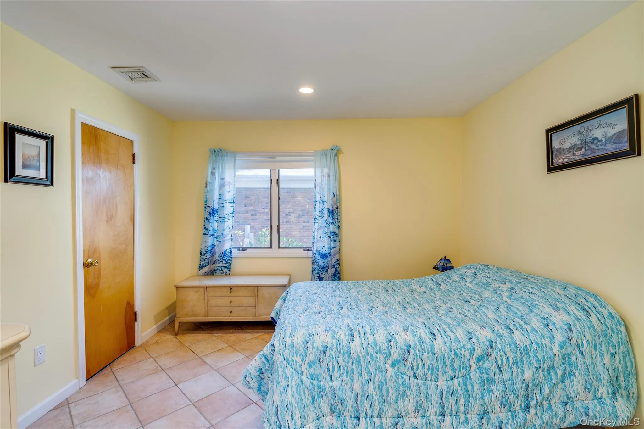 Bedroom with tile floors and access to stall shower, outside entrance and garage entrance. Bedroom is a walk-thru to access Bedroom 4. Bedroom with tile floors and access to stall shower, outside entrance and garage entrance. Bedroom is a walk-thru to access Bedroom 4.