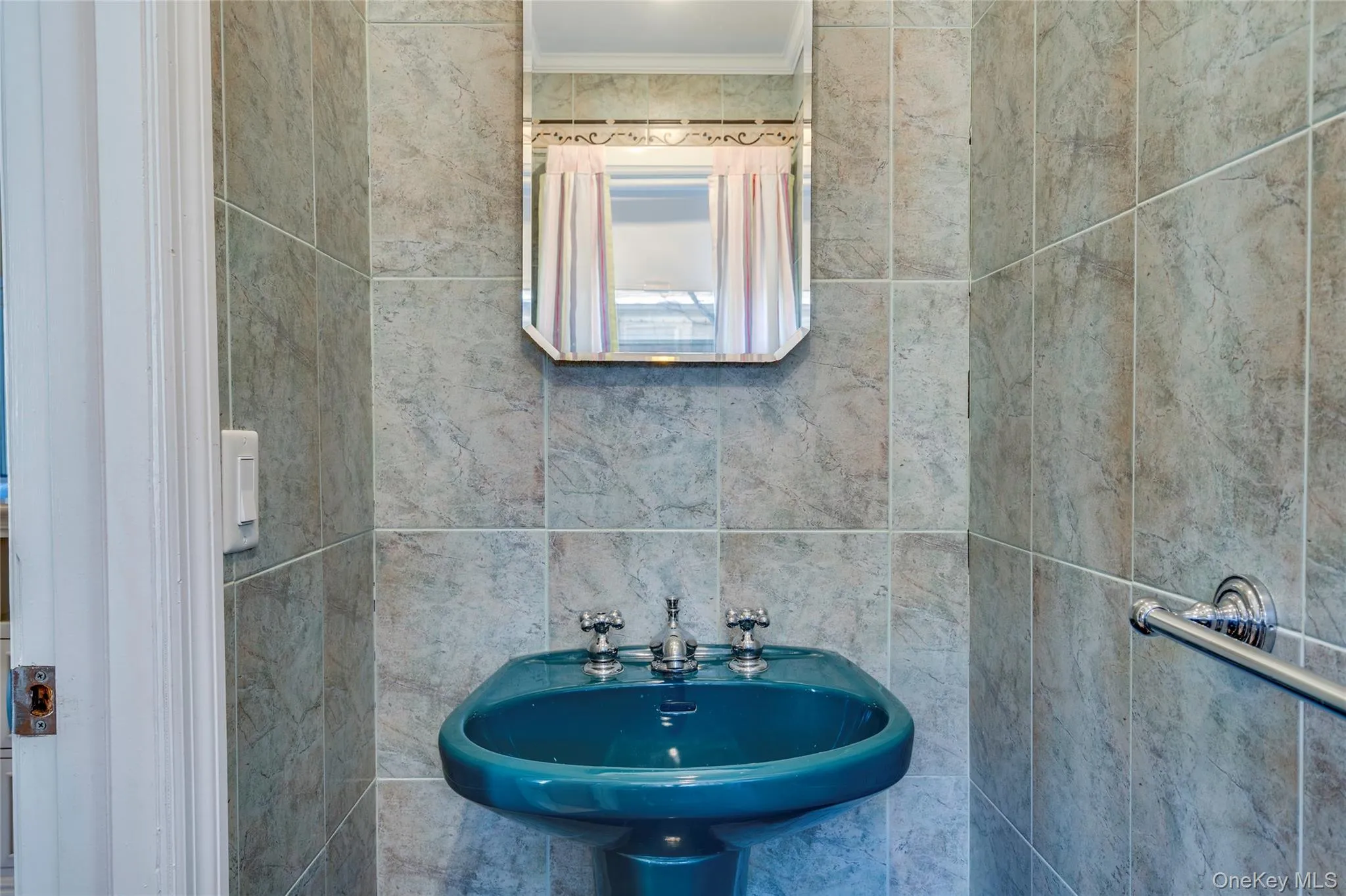 1/2 Bath with sink and toilet. 1/2 Bath with sink and toilet.
