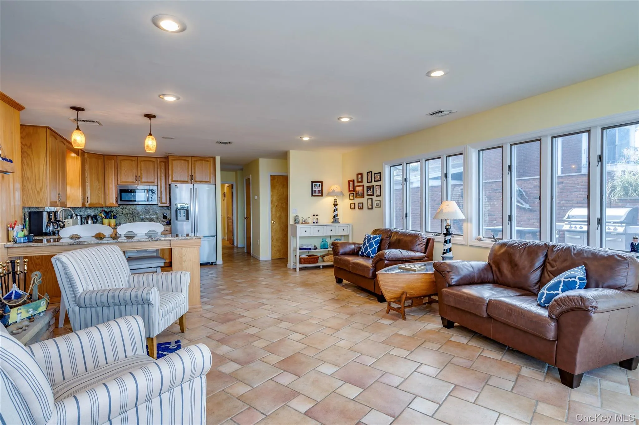 The living room sits between the dining room and kitchen and provides seamless access for entertaining. The living room sits between the dining room and kitchen and provides seamless access for entertaining.