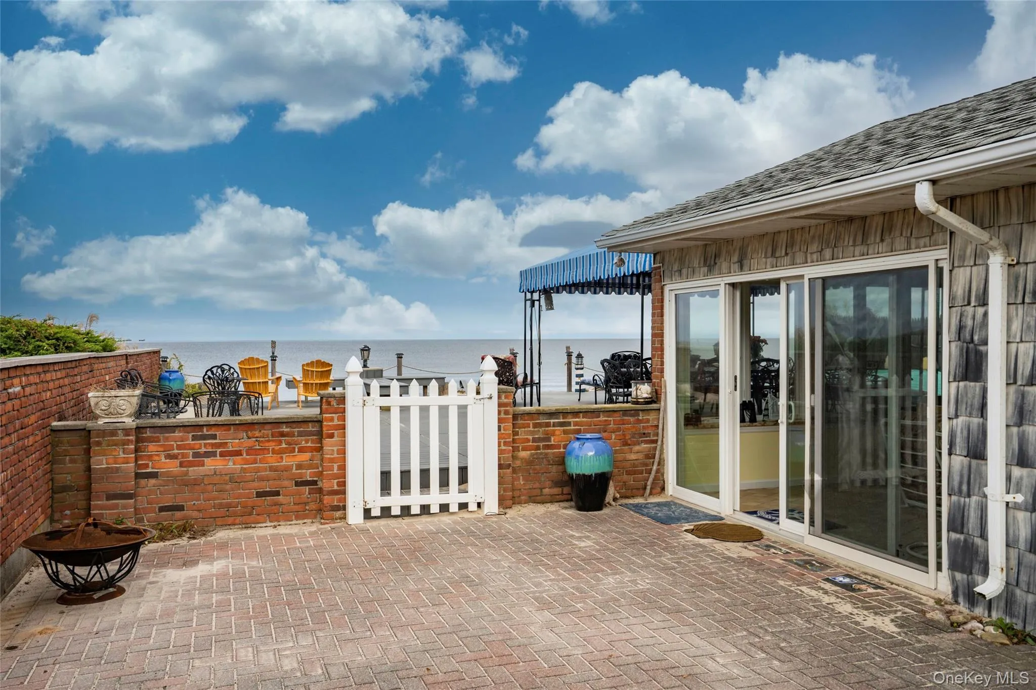Gated access to spacious beachfront deck and patio. Gated access to spacious beachfront deck and patio.