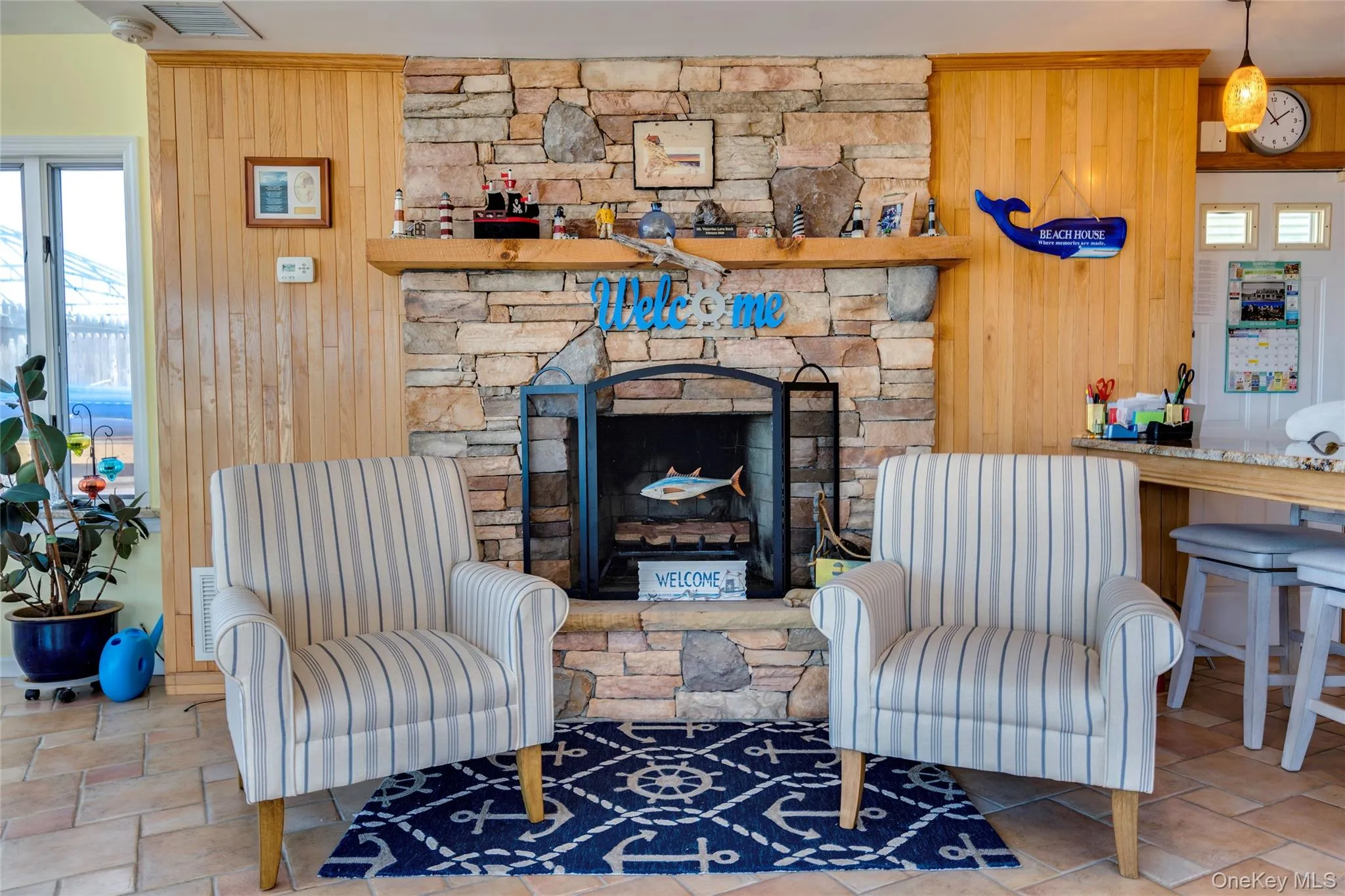 The Living room has a wood-burning fireplace. The Living room has a wood-burning fireplace.