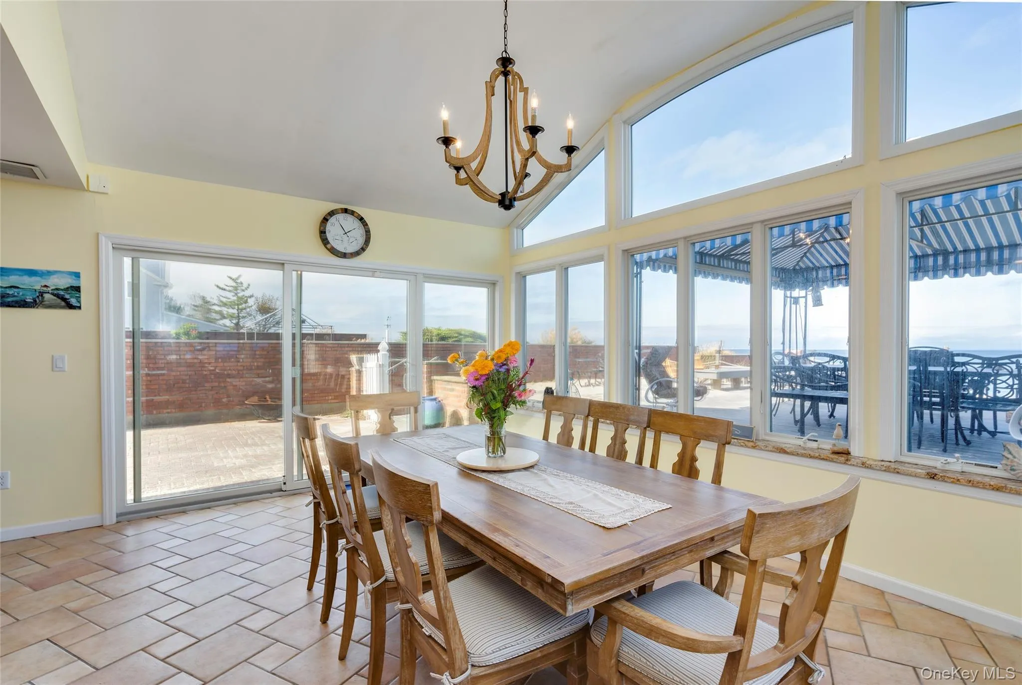 The dining area has walls of windows, surrounding you with natural light and stunning waterviews. The dining area has walls of windows, surrounding you with natural light and stunning waterviews.