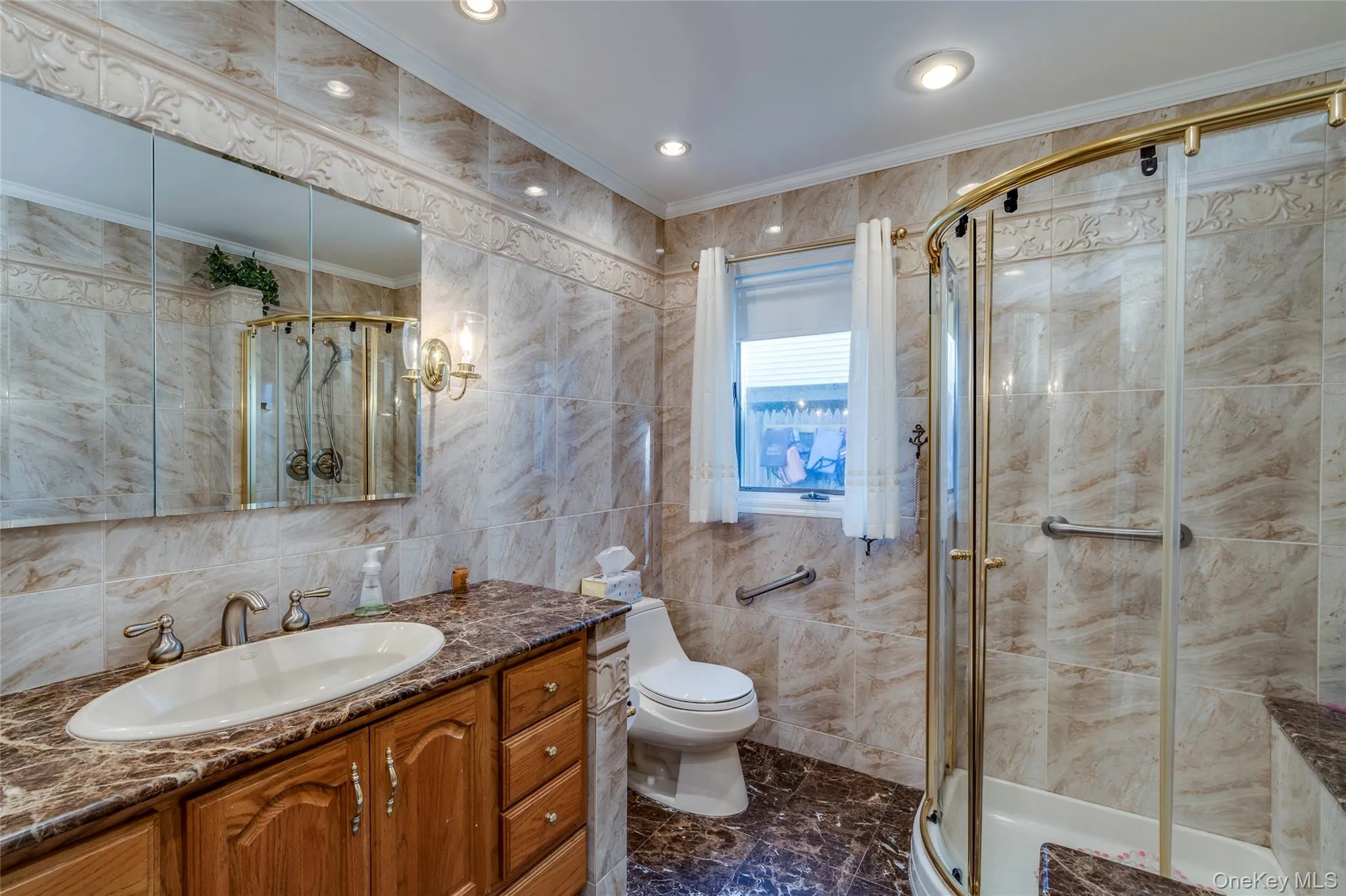 Full bath with tub and walk-in shower. Full bath with tub and walk-in shower.