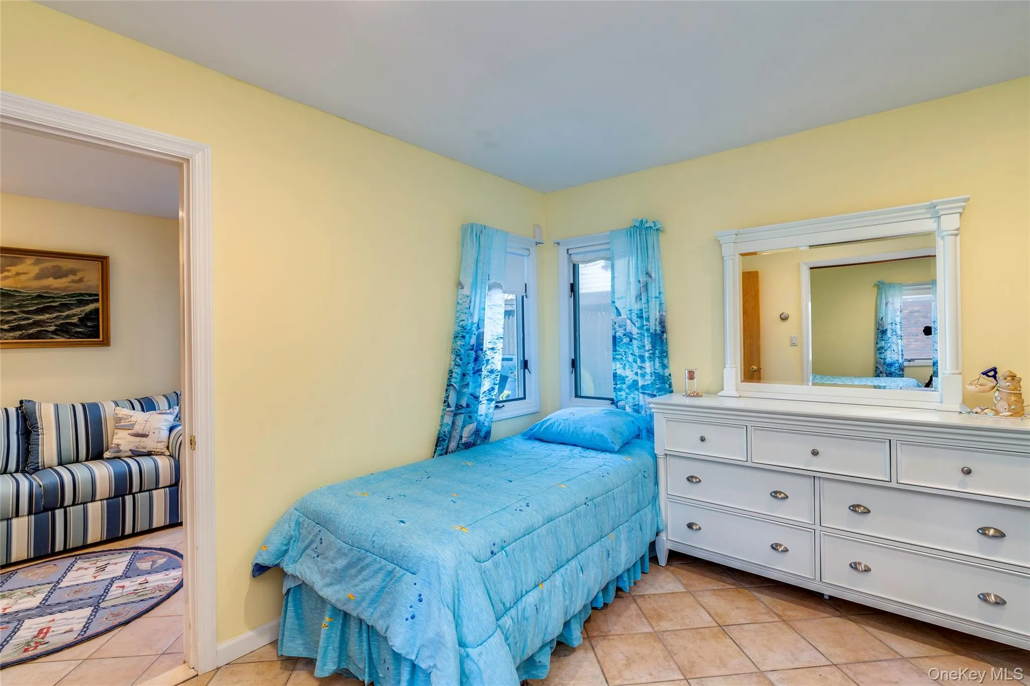 Bedroom with 2 twin beds, tile floors, walk-in closet and ensuite 1/2 bath. Bedroom with 2 twin beds, tile floors, walk-in closet and ensuite 1/2 bath.