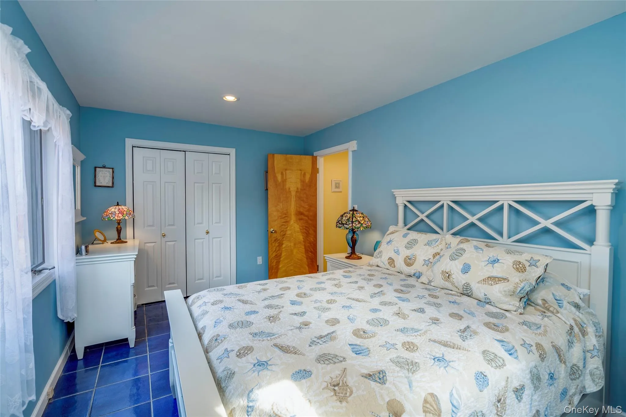 Largest bedroom with tile floors and double closet. Largest bedroom with tile floors and double closet.