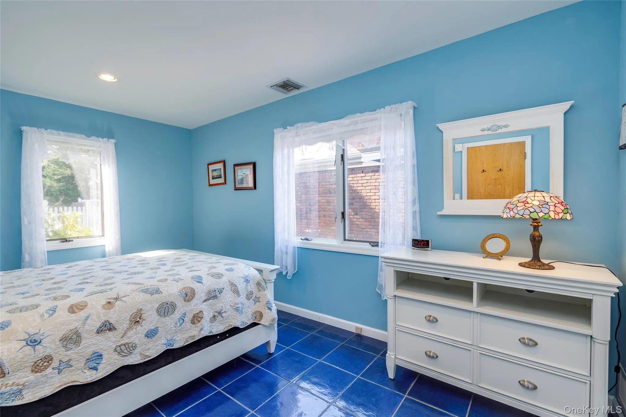 Largest bedroom with tile floors and double closet. Largest bedroom with tile floors and double closet.