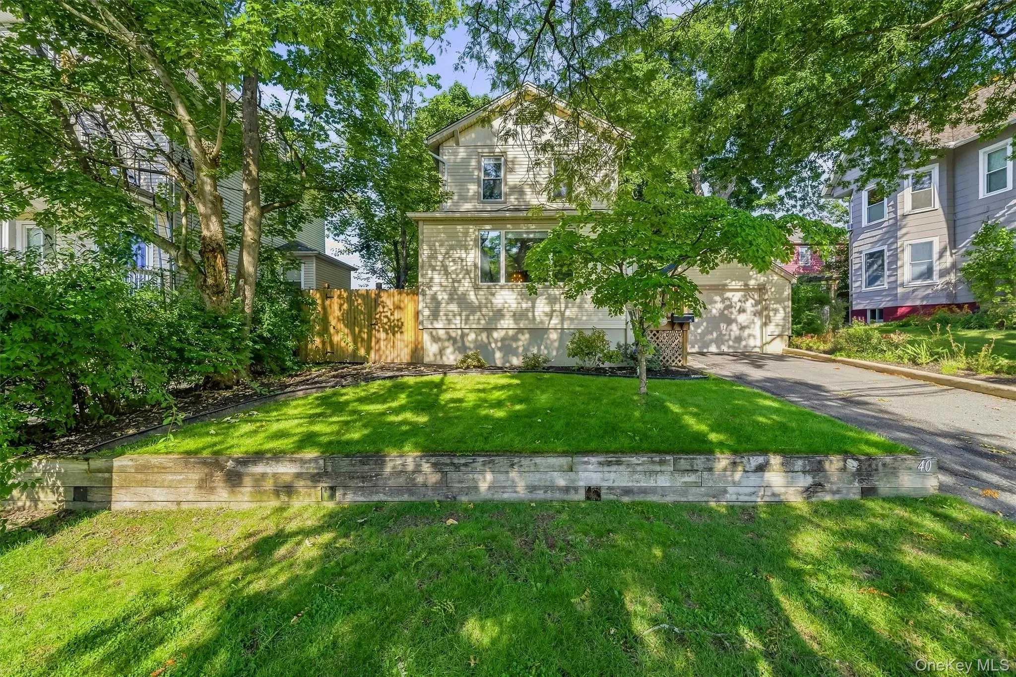 Front yard, well shaded from mature trees Front yard, well shaded from mature trees