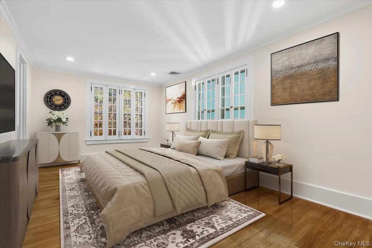 Generously proportioned bedroom offering privacy, hardwood floors and peaceful views. Generously proportioned bedroom offering privacy, hardwood floors and peaceful views.