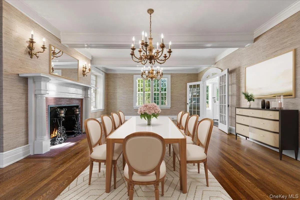 FORMAL DINING ROOMFormal dining room with fireplace and period detailing offers an elegant setting for intimate dinners and large gatherings. FORMAL DINING ROOMFormal dining room with fireplace and period detailing offers an elegant setting for intimate dinners and large gatherings.