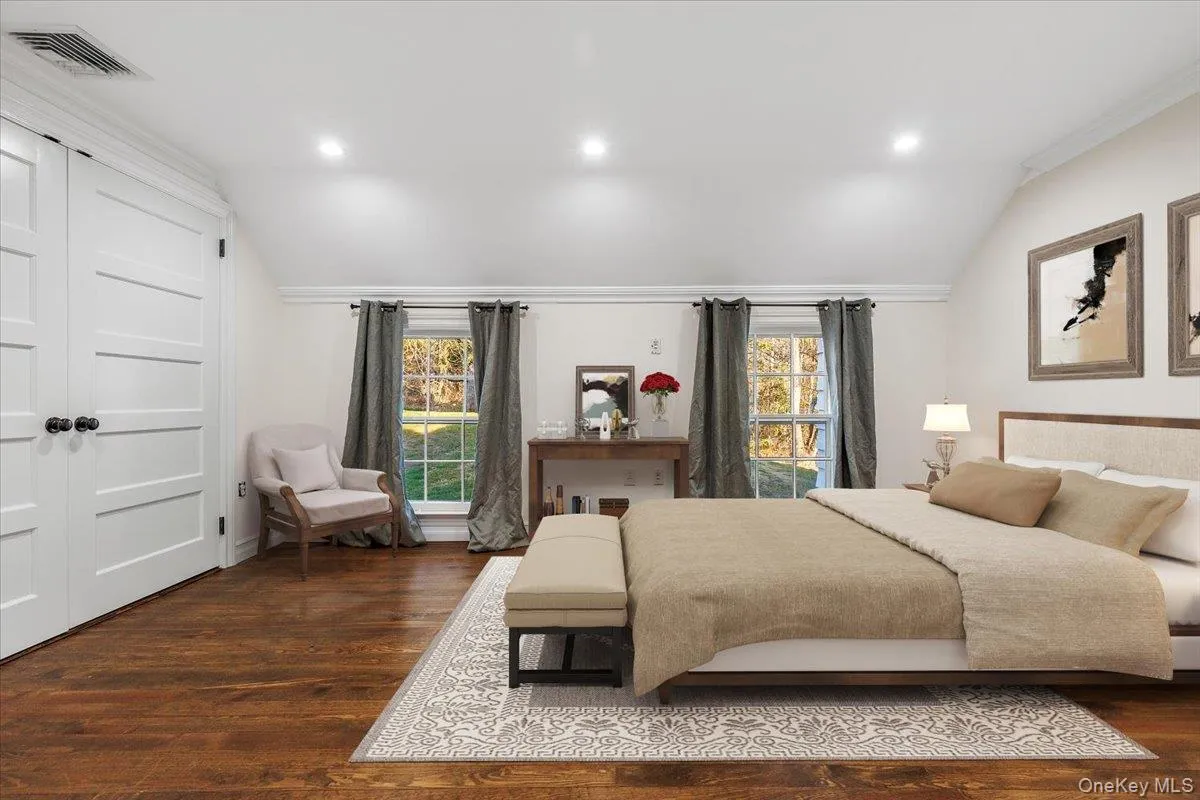 BEDROOMBright and spacious bedroom with multiple exposures and serene views of the surrounding property. BEDROOMBright and spacious bedroom with multiple exposures and serene views of the surrounding property.