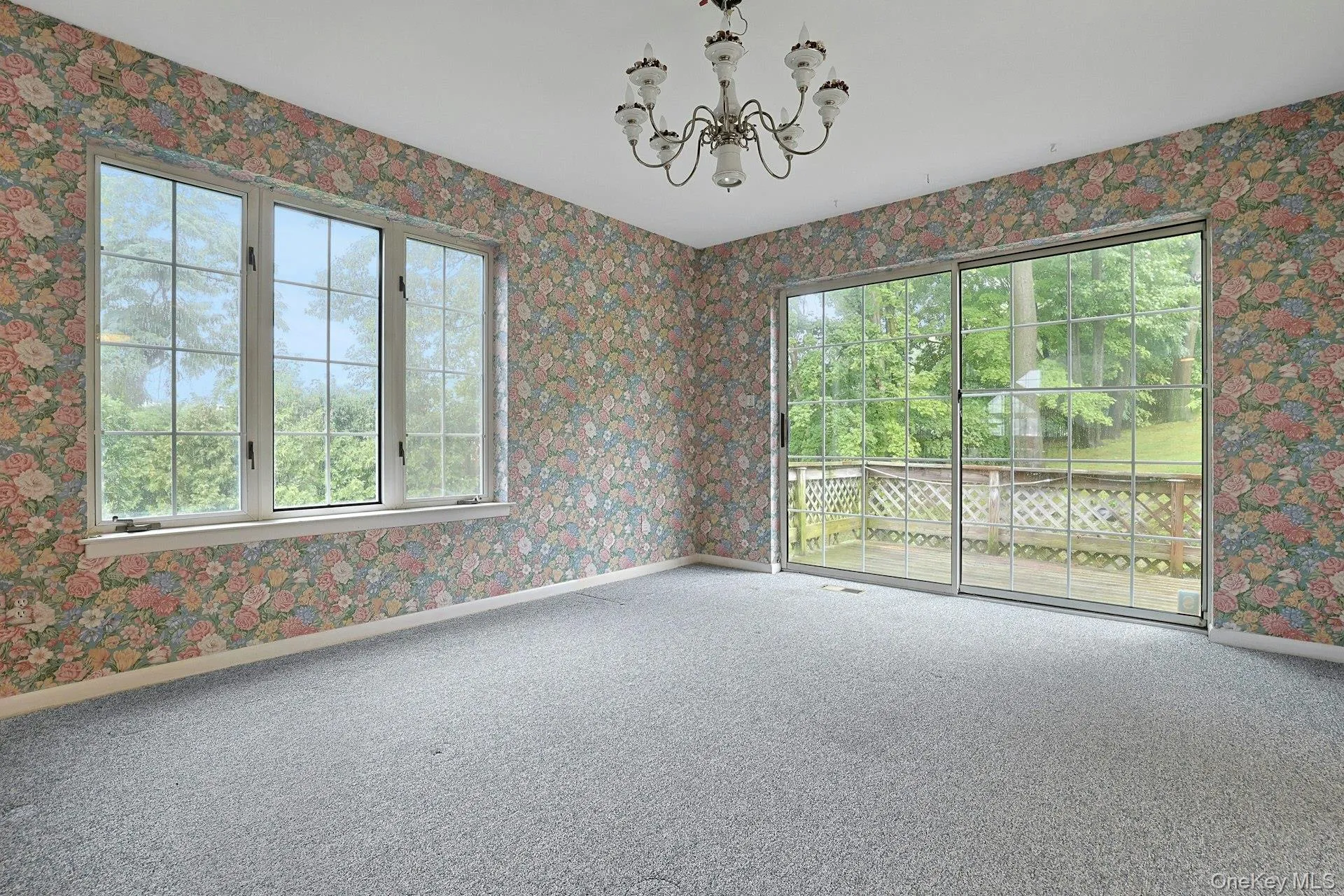 Bright Dining rm w oversized sliding glass door to deck Bright Dining rm w oversized sliding glass door to deck