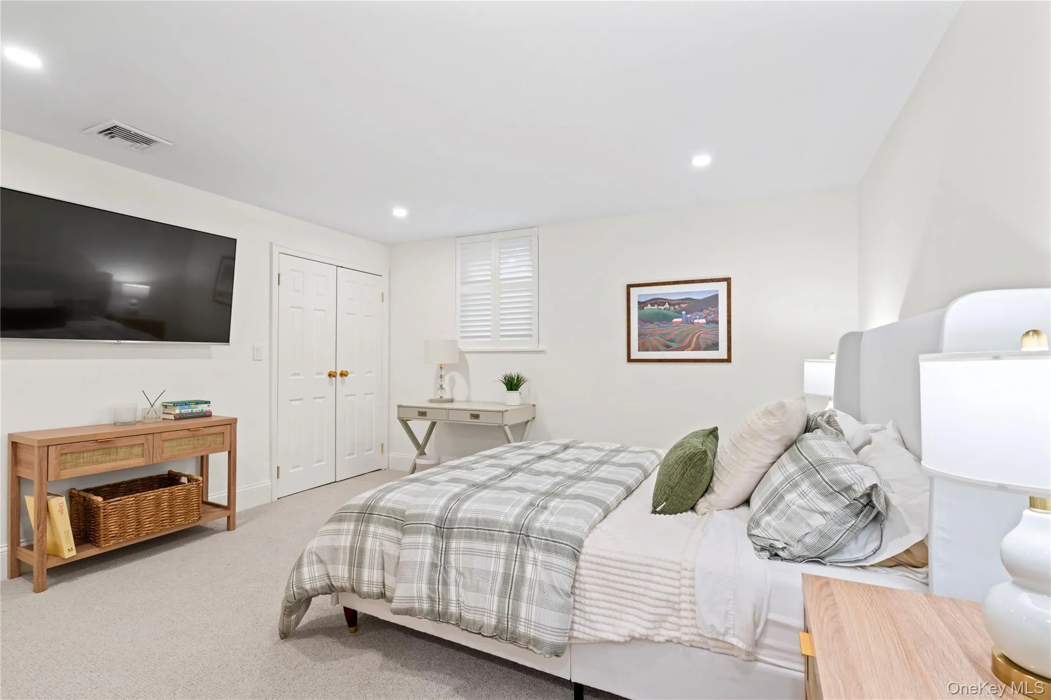 Lower level Guest Bedroom with Recessed Lighting, a Closet and Carpet. Lower level Guest Bedroom with Recessed Lighting, a Closet and Carpet.
