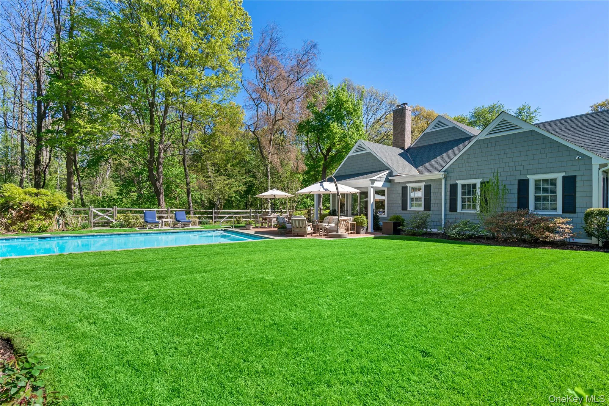 View of Yard featuring a Patio Area. View of Yard featuring a Patio Area.